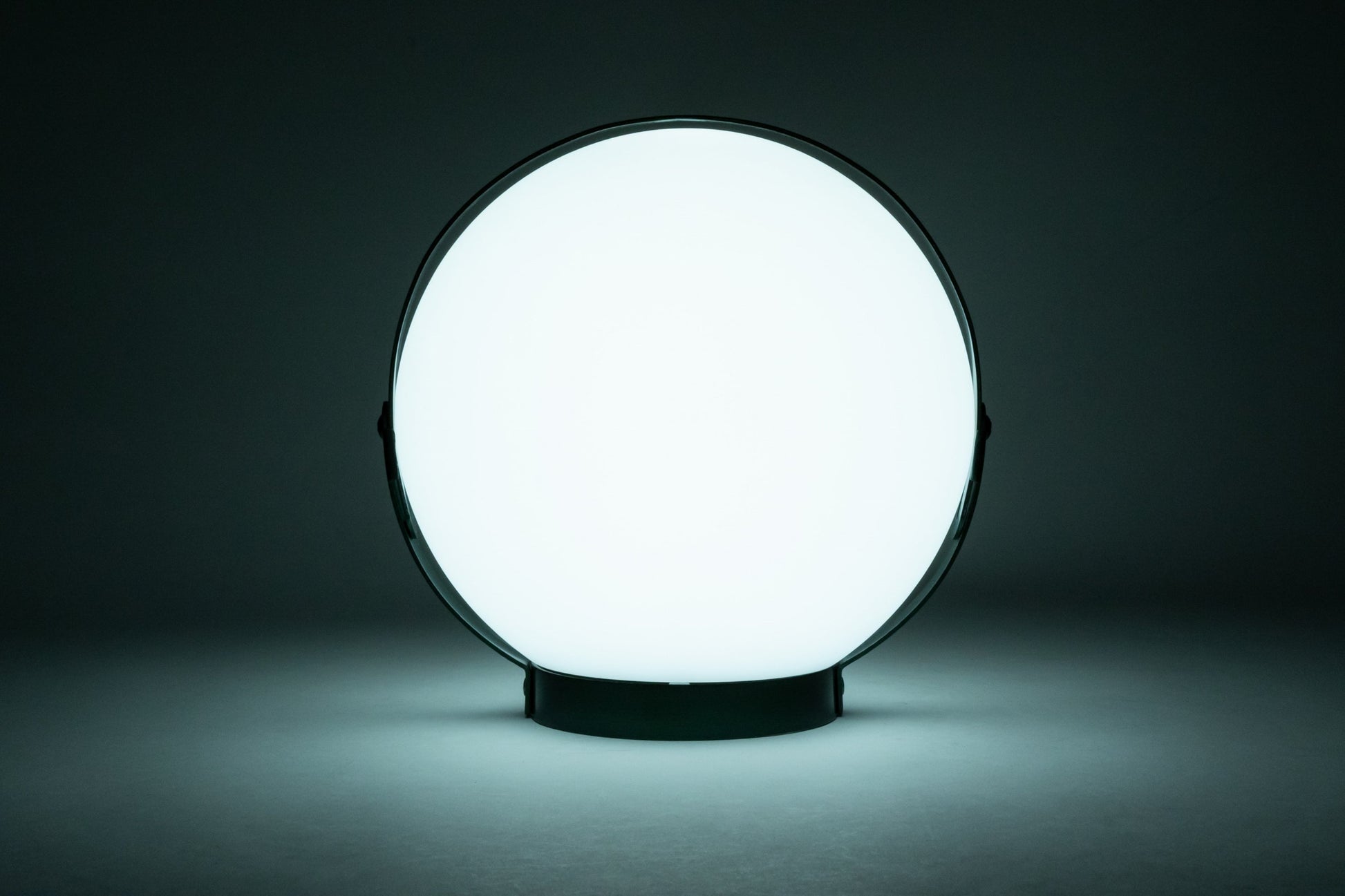 Allsop Home & Garden Moonrise portable rechargeable LED lantern with handle, glowing light, suitable for outdoor use.