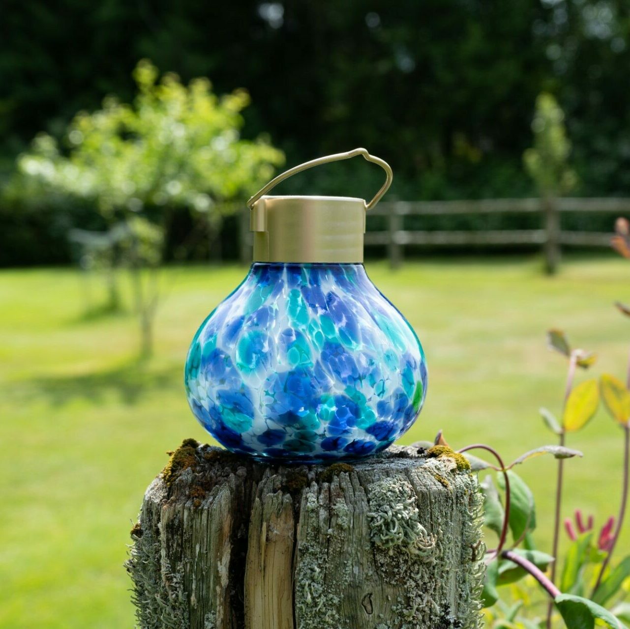 Periwinkle solar tea lanterns by Allsop Home & Garden, 5-inch handblown glass lanterns for outdoor decor.