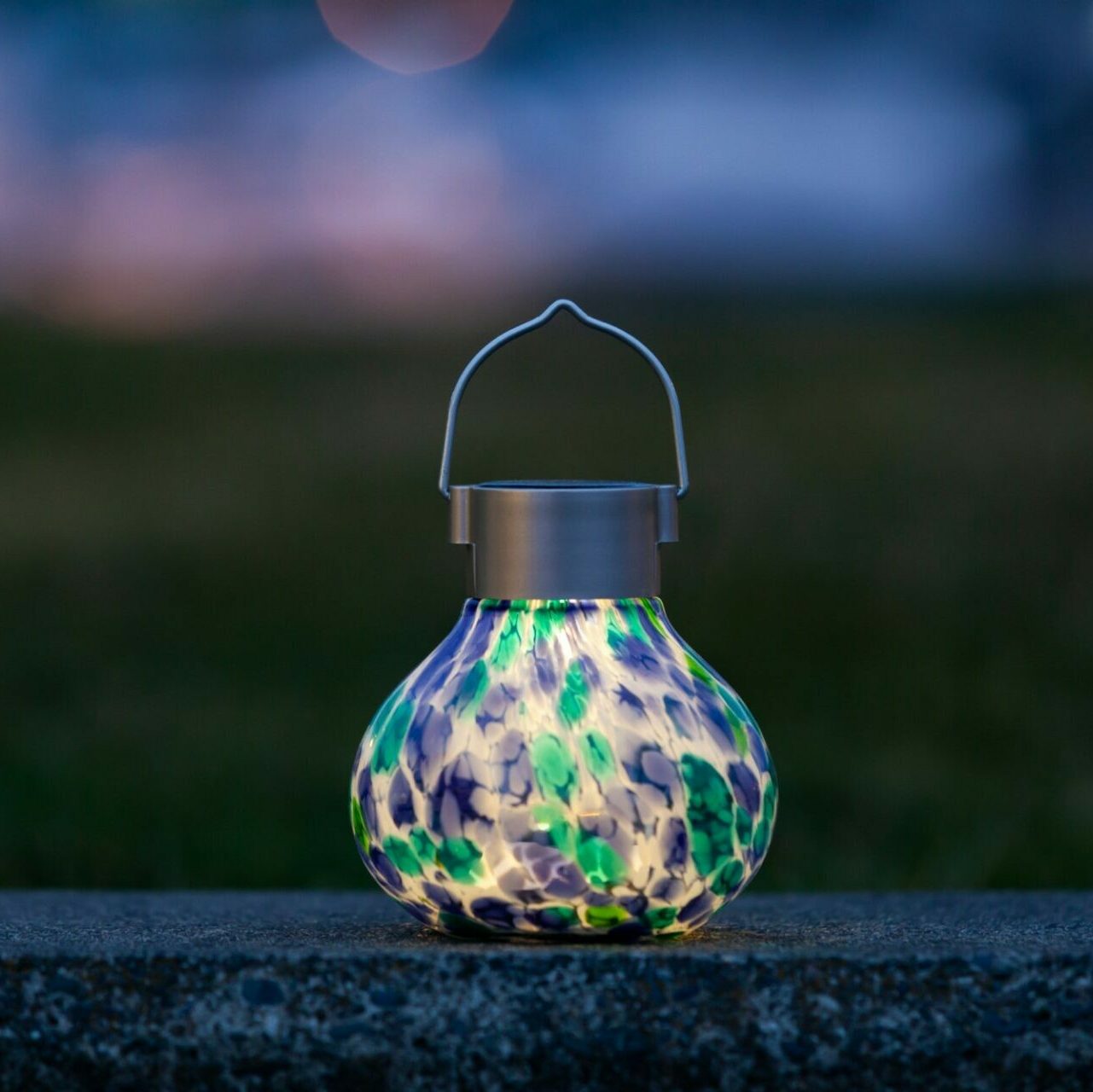 Periwinkle solar tea lanterns by Allsop Home & Garden, 5-inch handblown glass lanterns for outdoor decor.