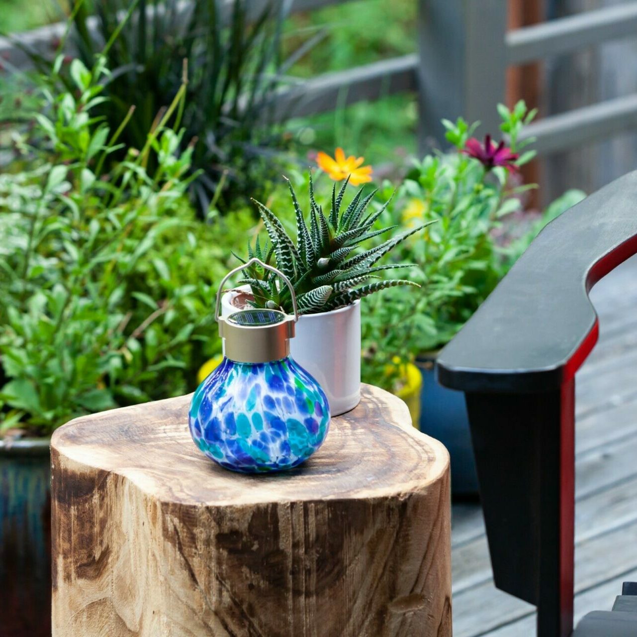 Periwinkle solar tea lantern by Allsop Home & Garden, 5-inch handblown glass lantern with a decorative outdoor lighting design.