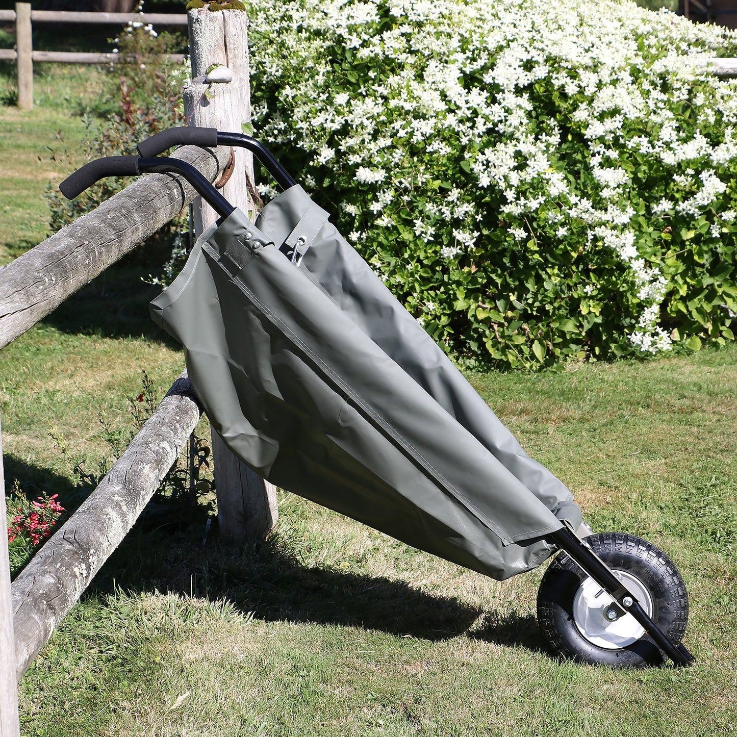 Allsop Home & Garden WheelEasy foldable garden cart wheelbarrow with handles and large wheels for easy gardening tasks.