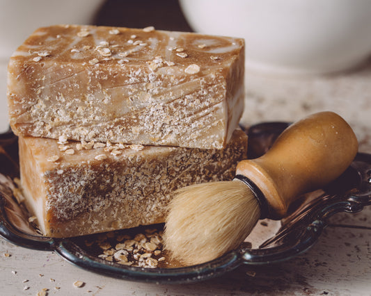 Organic handmade soap by Sweet Harvest Farms with natural ingredients, showcasing a rustic, artisanal appearance.