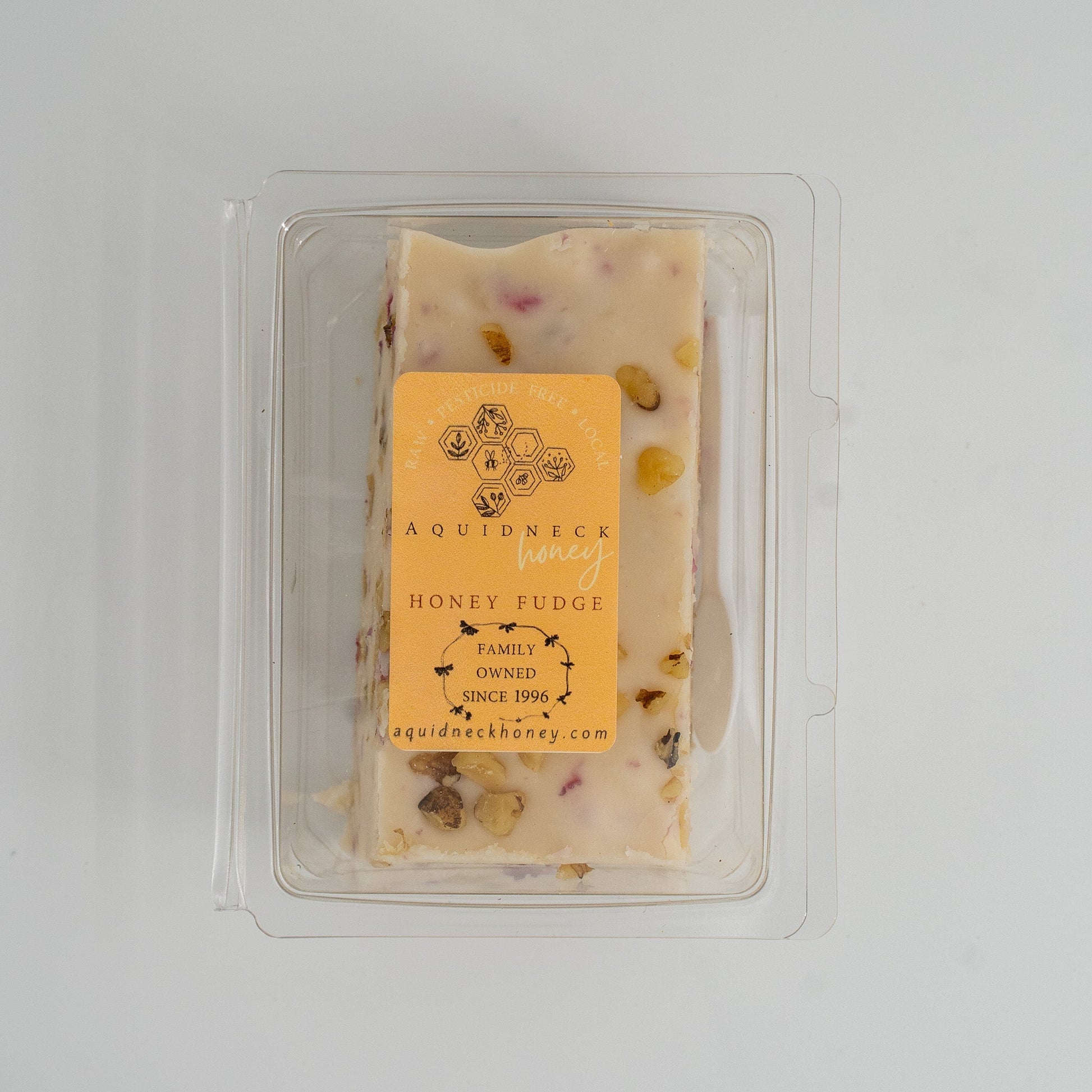 Cranberry walnut honey fudge by Aquidneck Honey, showing rich fudge with cranberry pieces and walnut chunks on top.