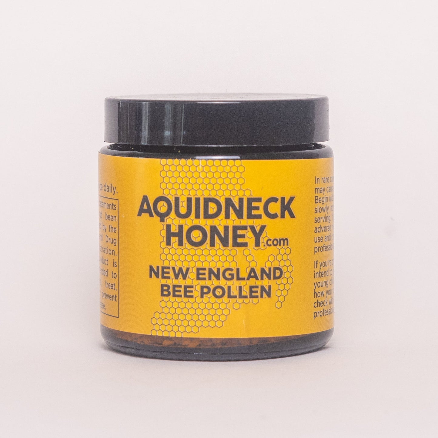 Pure raw bee pollen from Aquidneck Honey, showcasing golden bee pollen granules collected from New Hampshire, Rhode Island, and Massachusetts.