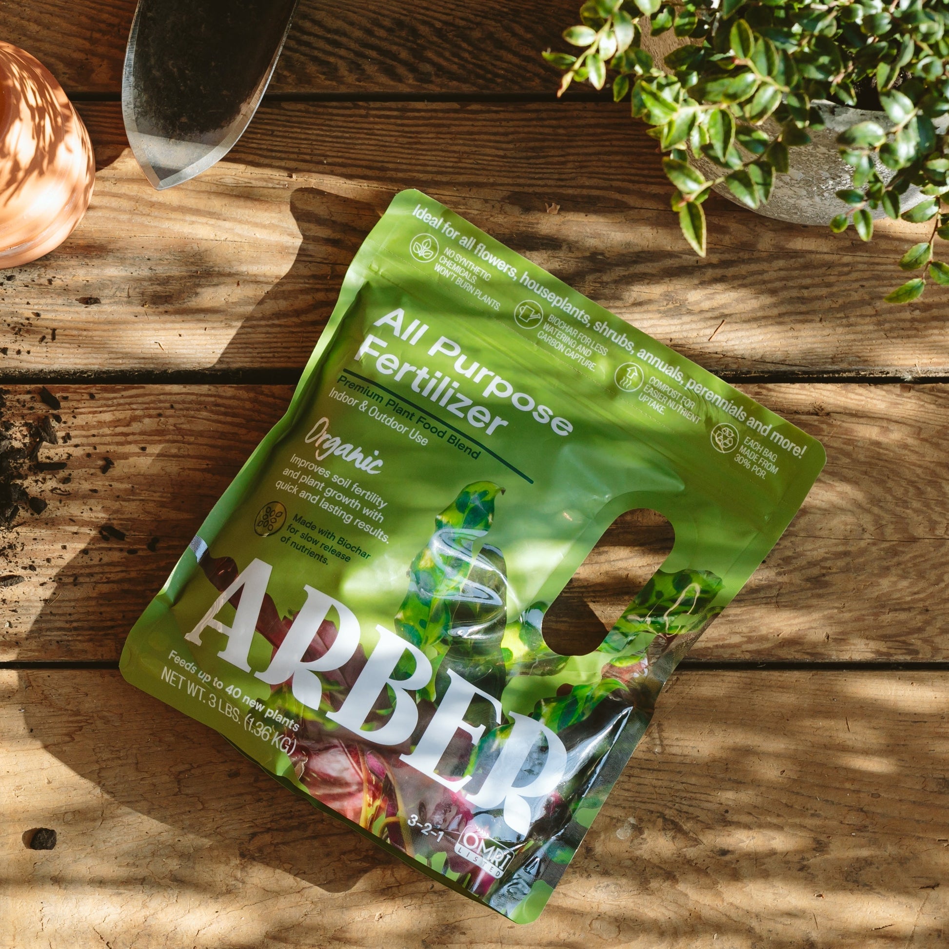 Organic all-purpose fertilizer by Arber, showing a bag of natural plant nutrient fertilizer suitable for various garden uses.