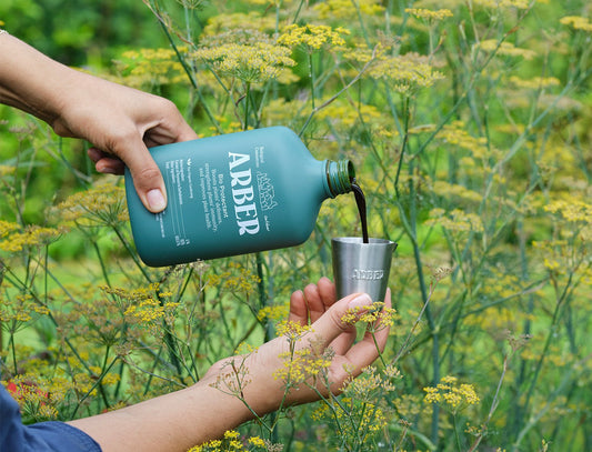 Organic Bio Protectant by Arber shown in a clear container, designed for natural plant protection and organic gardening.