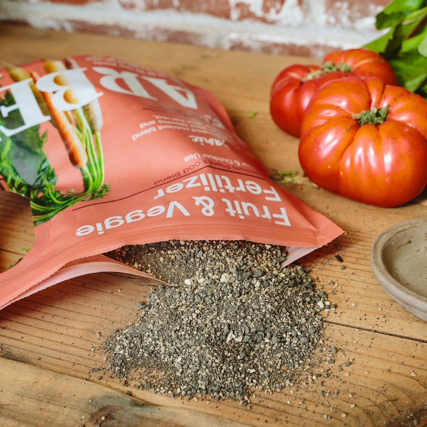 Organic Fruit and Veggie Fertilizer by Arber, showing a bag of natural fertilizer for healthy plant growth.