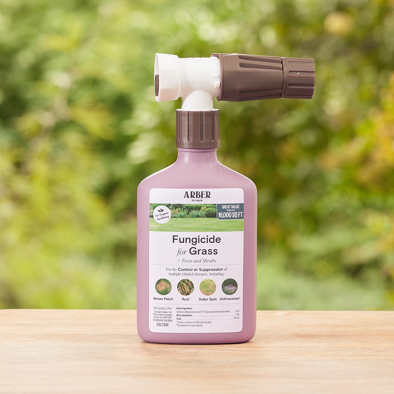 Organic fungicide for grass, trees, and shrubs by Arber, showing a container of natural plant protection product.
