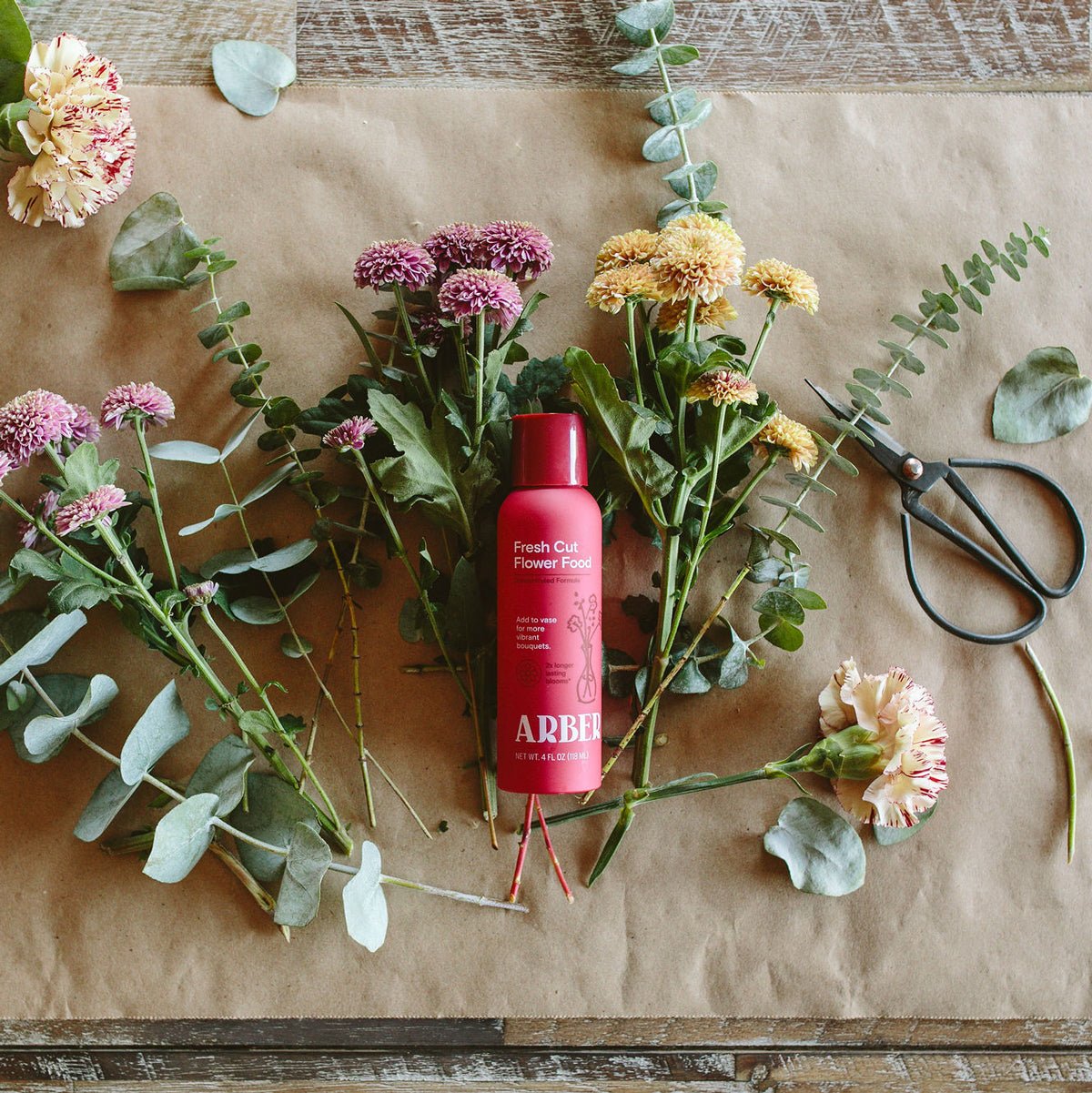 Bottle of Arber Fresh Cut Flower Food for maintaining fresh cut flowers and floral arrangements.