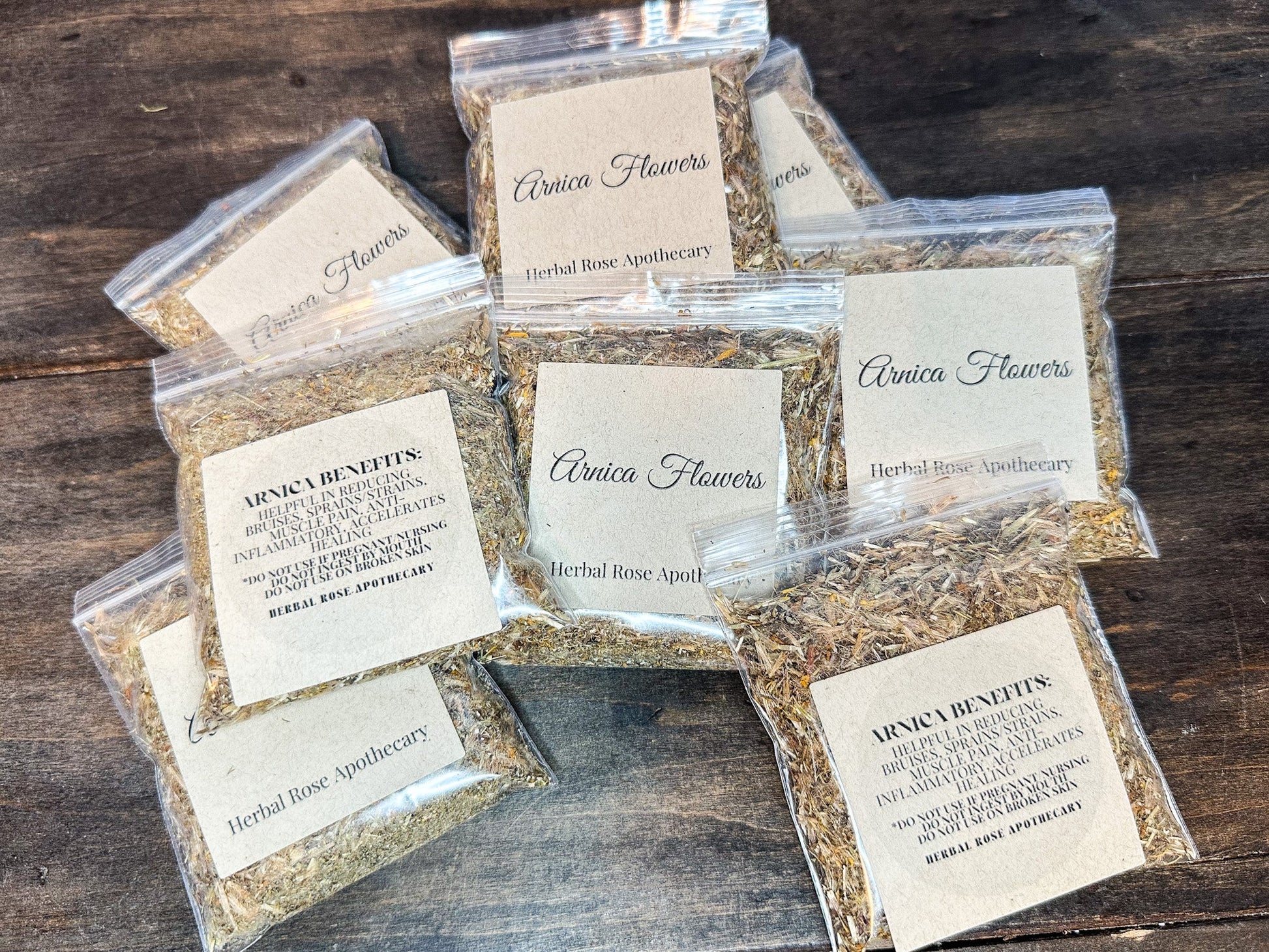 Dried arnica flowers from HerbalRoseApothecary, showcasing vibrant yellow herbs used for natural healing and herbal remedies.