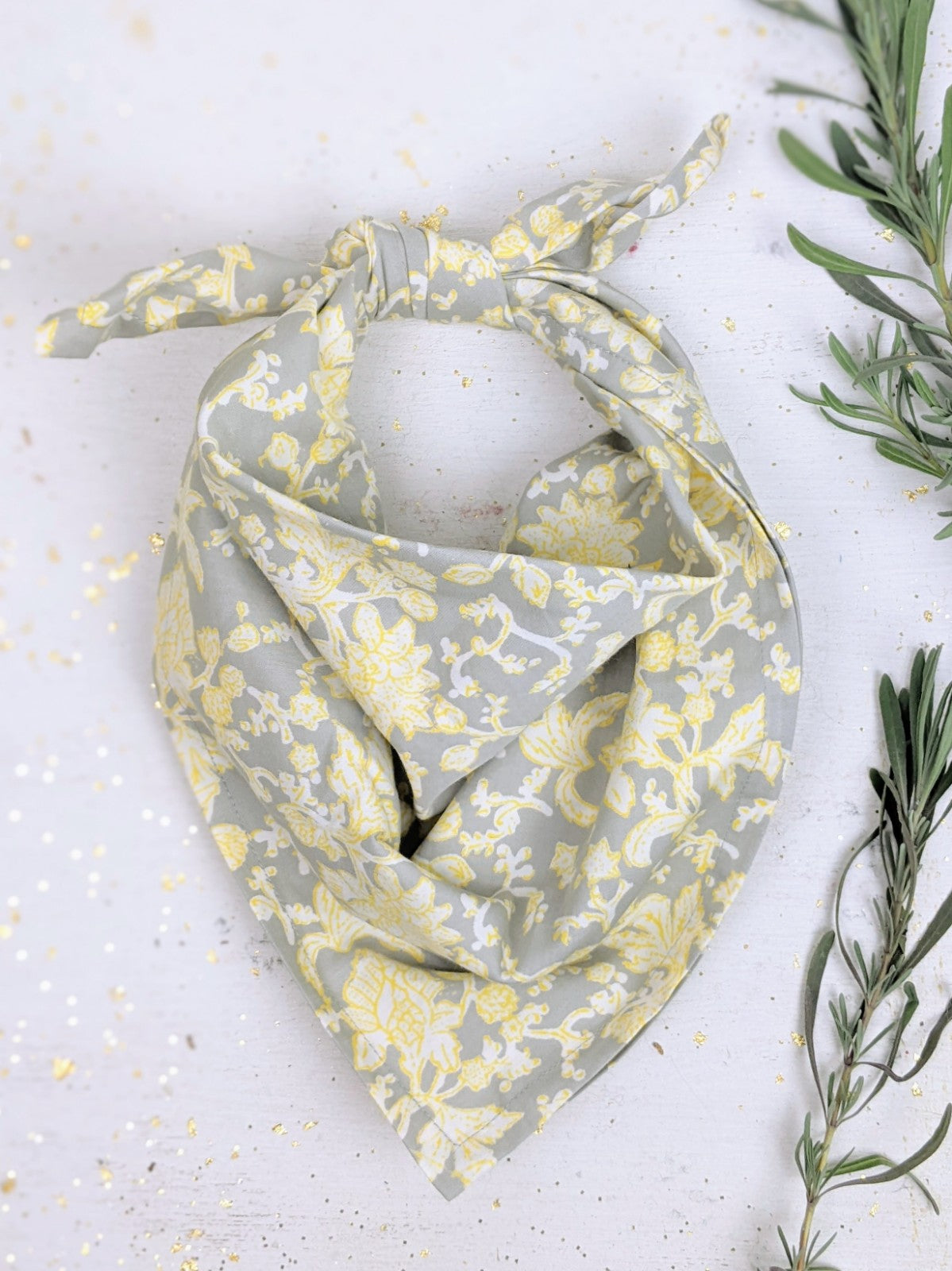 Navy organic cotton bandana by Ash & Rose, featuring a classic square design with soft, natural fabric and subtle branding.