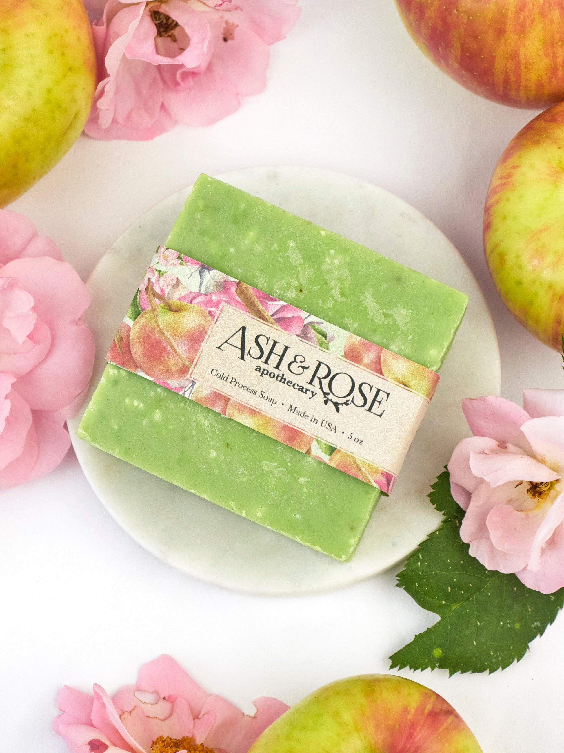 Ash & Rose Apple Rose Soap Scrub Bar, natural bar soap with apple and rose scent, textured surface for exfoliation.