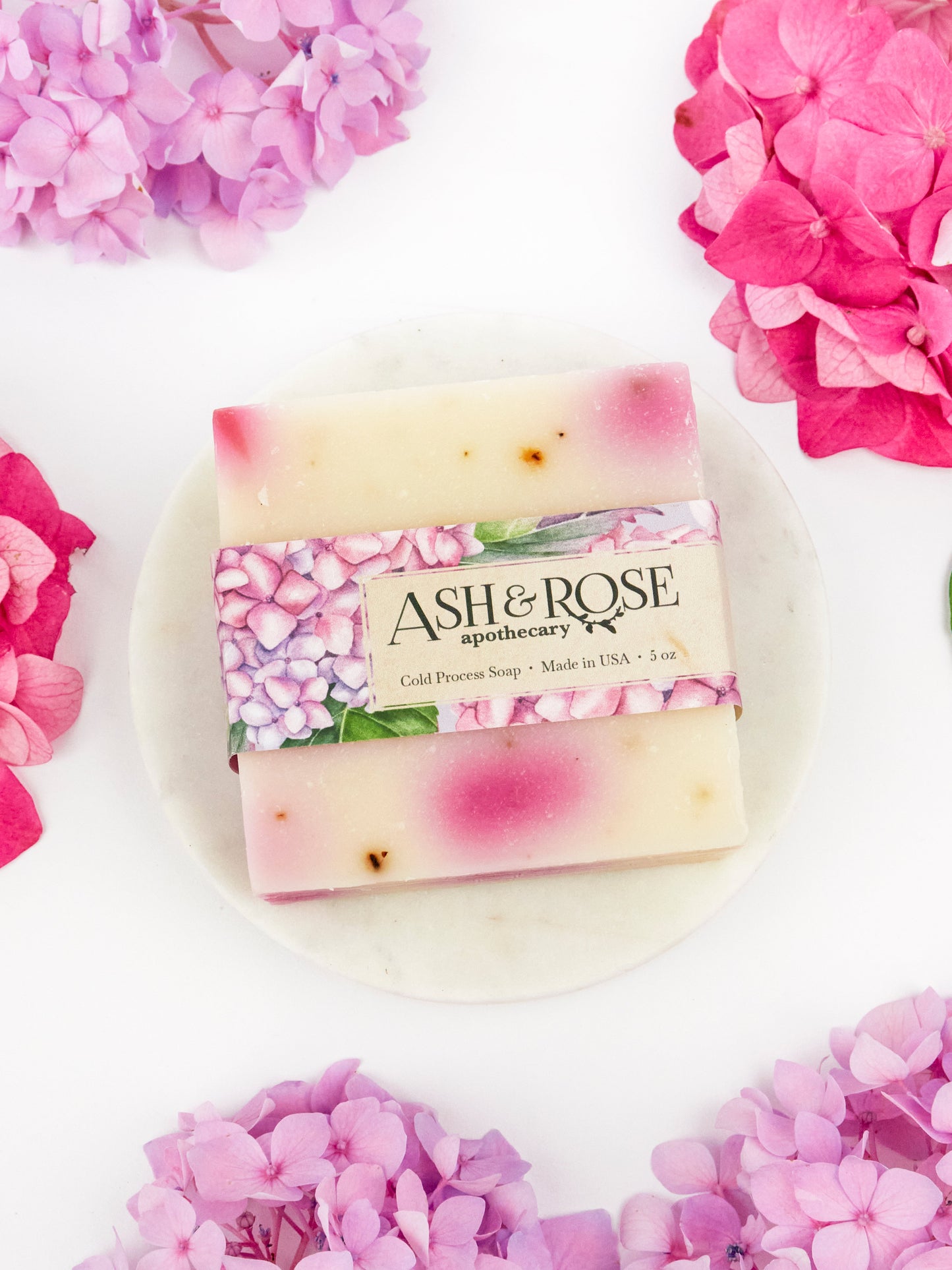 Ash & Rose Pink Hydrangea Soap Scrub Bar, a luxurious bar soap with floral hydrangea scent and exfoliating texture.