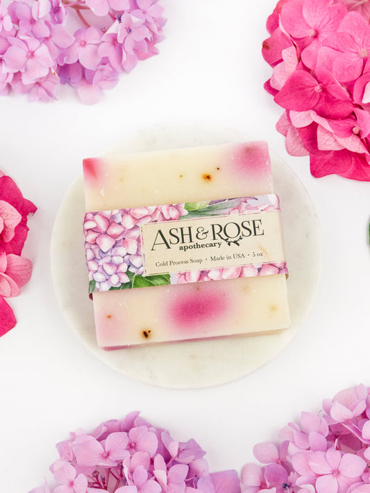 Ash & Rose Pink Hydrangea Soap Scrub Bar, a luxurious bar soap with floral hydrangea scent and exfoliating texture.
