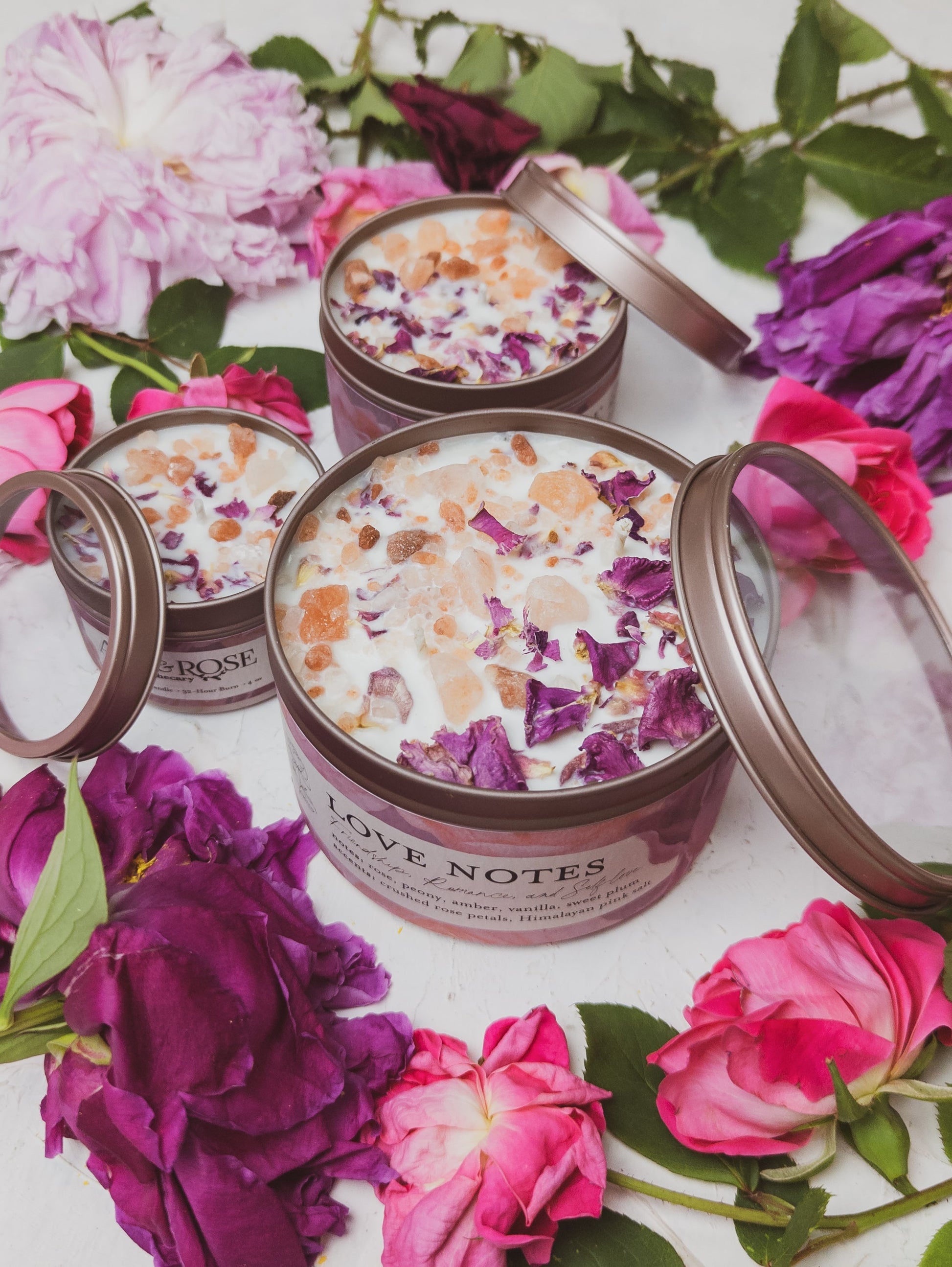 Ash & Rose LOVE NOTES Rose and Pink Salt Candle, 4 oz, with a soft pink candle in a glass jar featuring a romantic label.