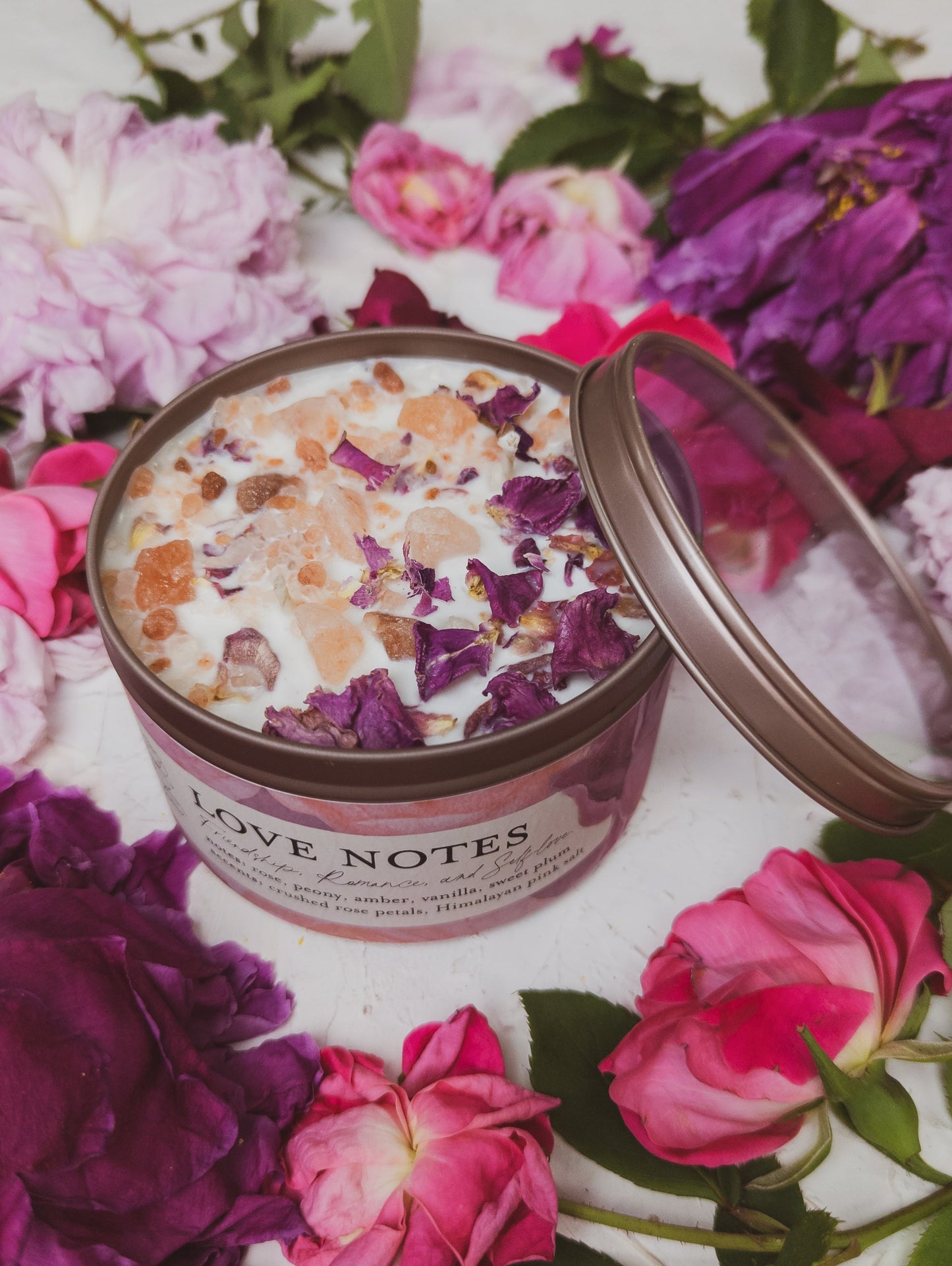 Ash & Rose LOVE NOTES Rose and Pink Salt candle in a 4 oz jar with a pink and rose design, perfect for relaxing ambiance.