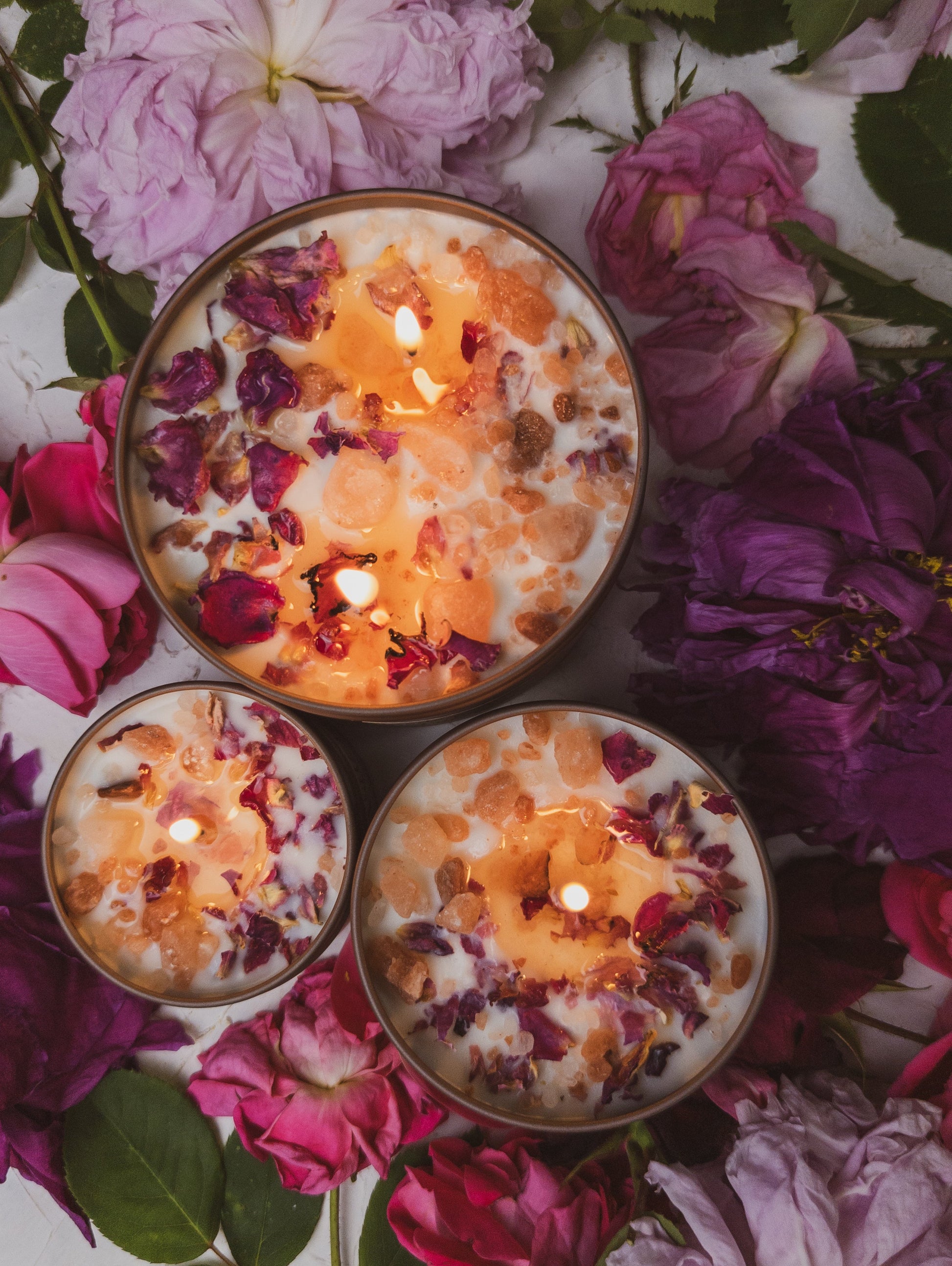 Ash & Rose Love Notes Rose and Pink Salt candle featuring a glass jar with a white wax candle and decorative pink salt.