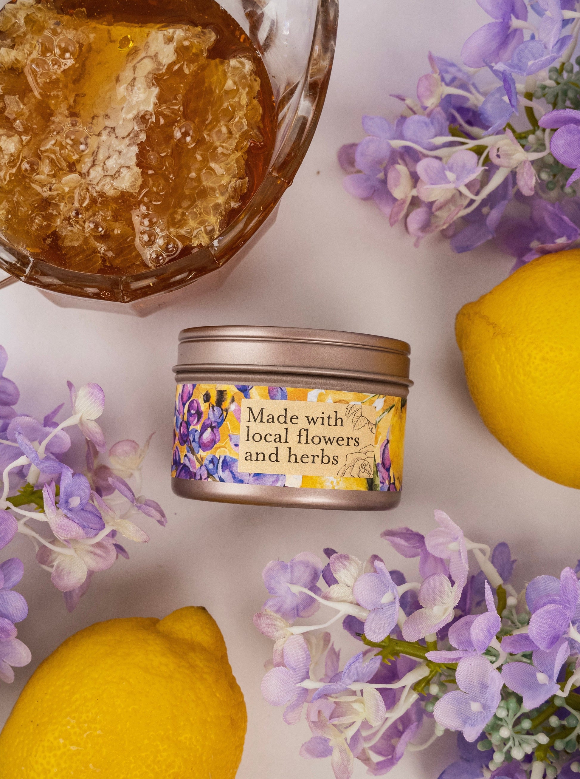 Ash & Rose Nectar Lilac Lemon Honey candle in a 4 oz container, featuring a floral and citrus scented design.