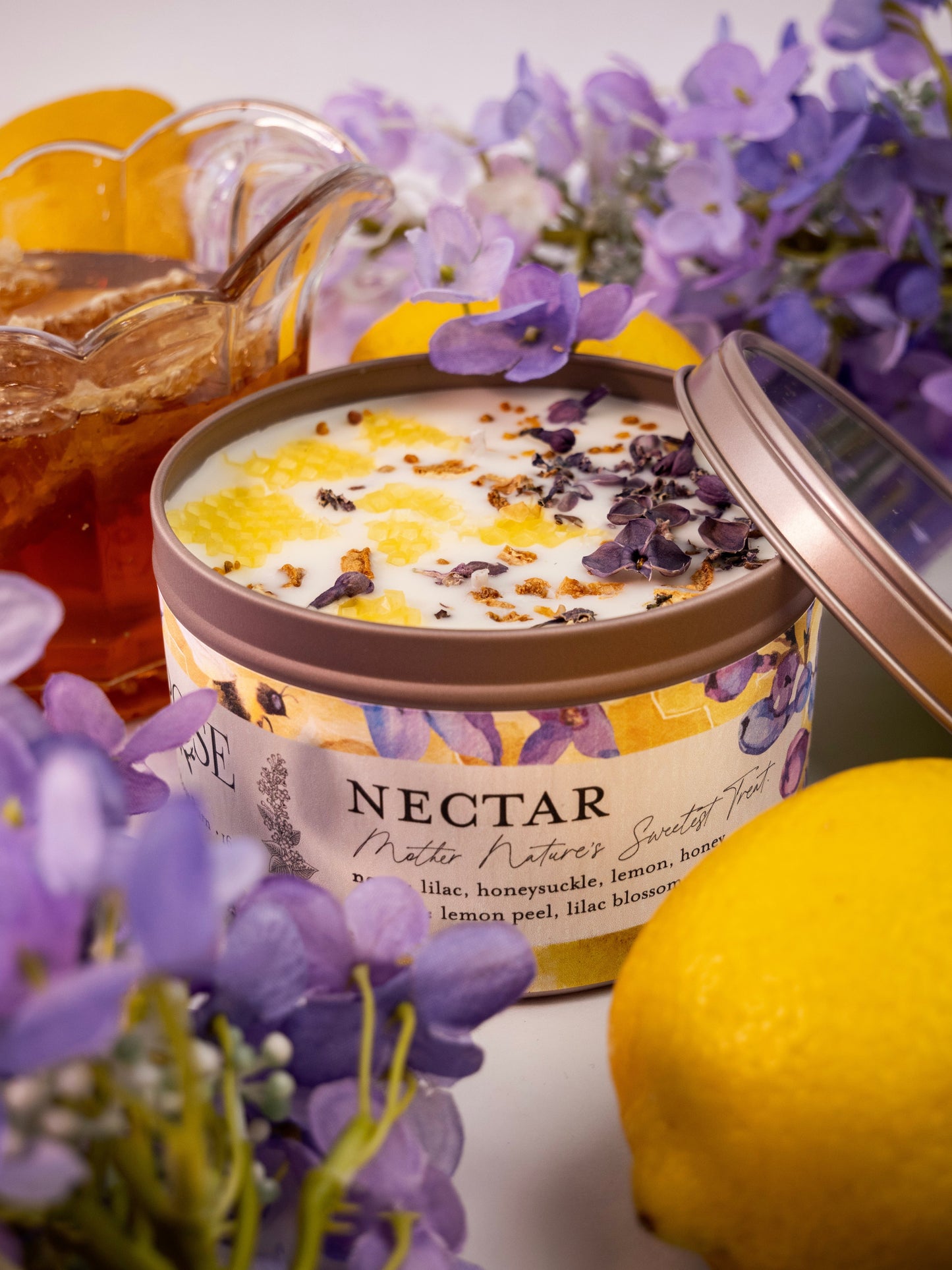 Ash & Rose Nectar Lilac Lemon Honey candle, 4 oz, with a lilac and lemon scent, featuring a decorative candle with a natural wax finish.