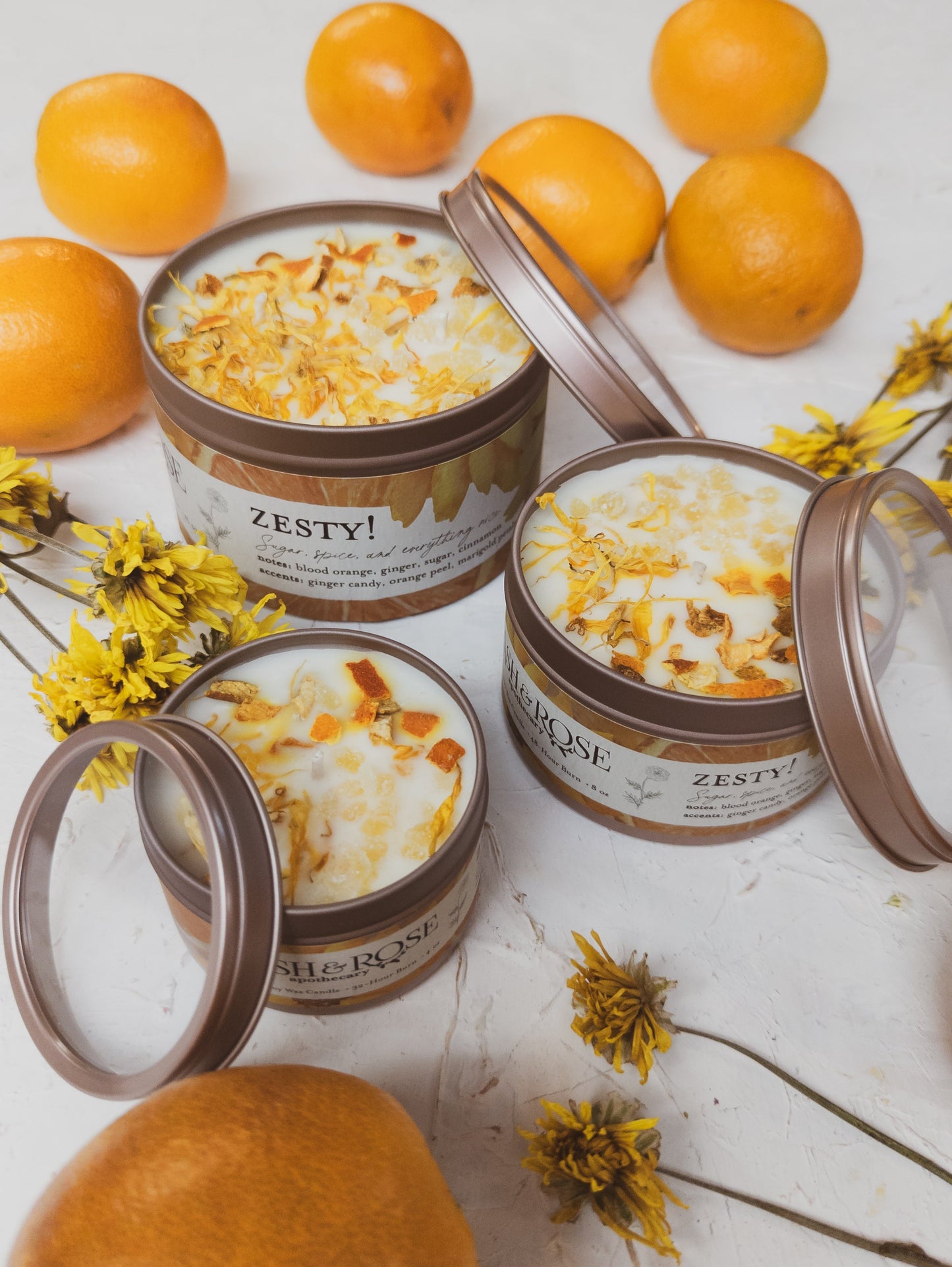 Ash & Rose ZESTY! Orange Ginger candle, 4 oz, featuring vibrant orange and ginger aroma in a stylish candle jar.