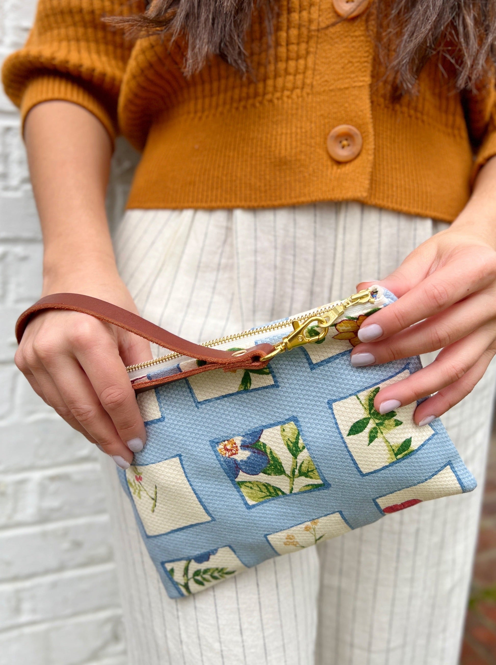 Ash & Rose Summer Meadow wristlet purse featuring floral design and compact size, perfect for carrying essentials.