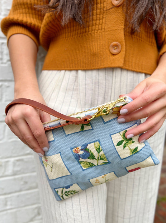 Ash & Rose Summer Meadow wristlet purse featuring floral design and compact size, perfect for carrying essentials.