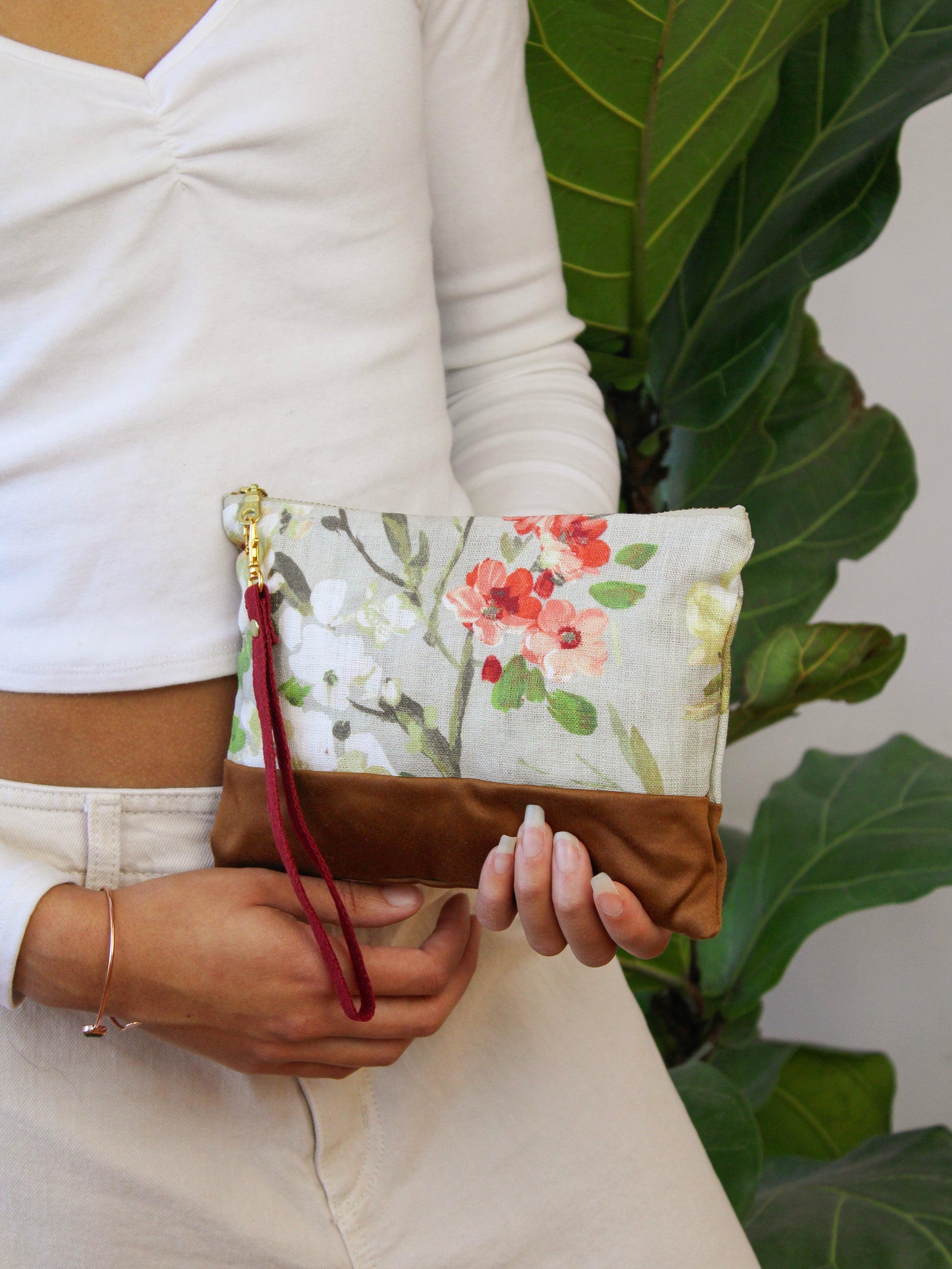 Dusty blue Ash & Rose antique roses handbag with elegant floral embroidery and classic purse design.