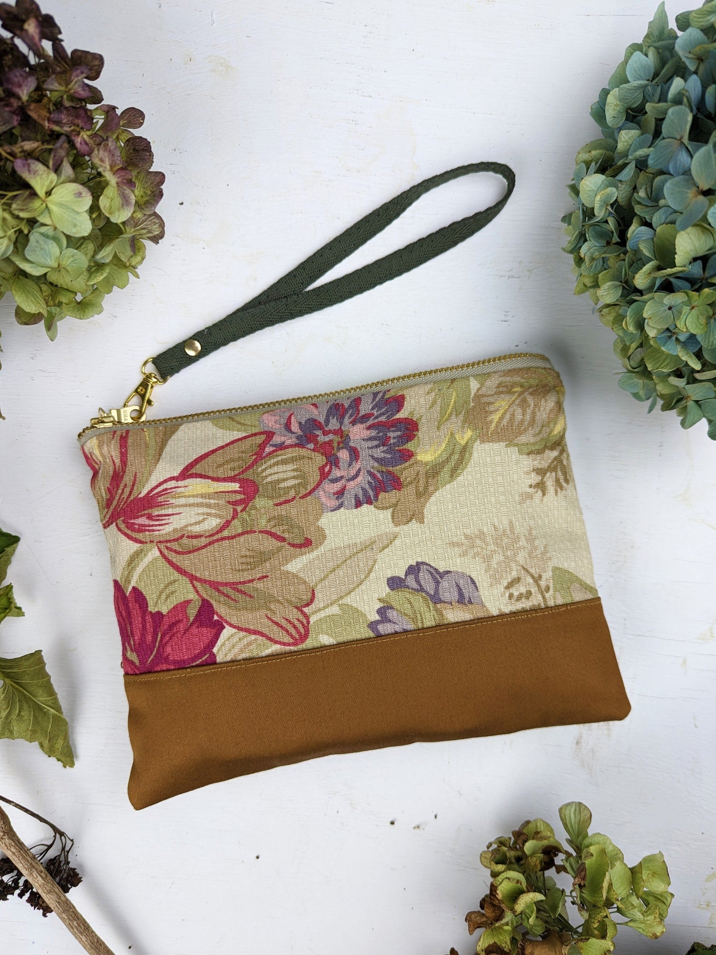 Dusty blue Ash & Rose antique roses handbag, stylish purse with elegant floral design and structured shape.