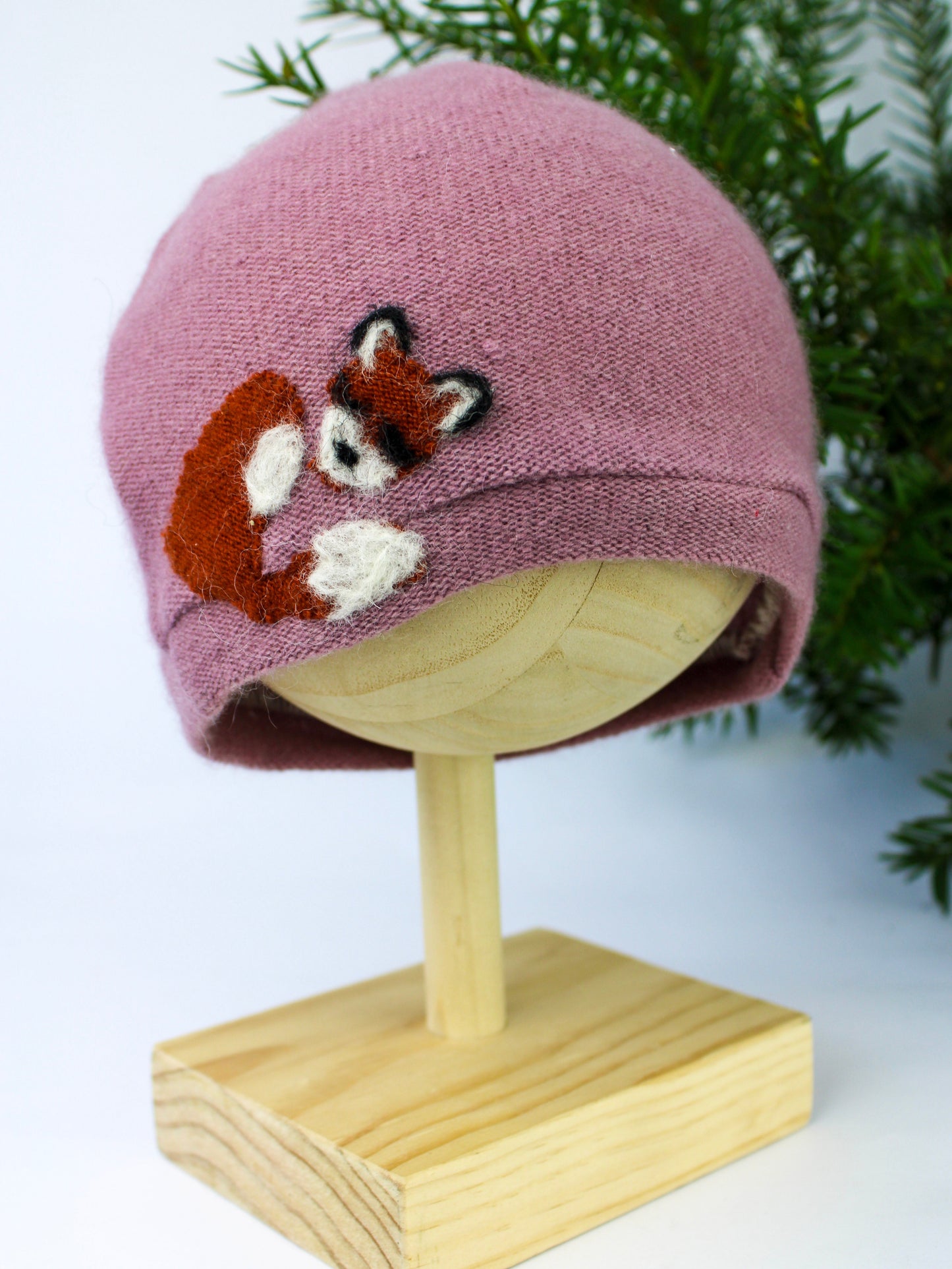 Child's sleeping fox cashmere hat by Ash & Rose, soft sky-blue knit hat featuring a cute sleeping fox design.
