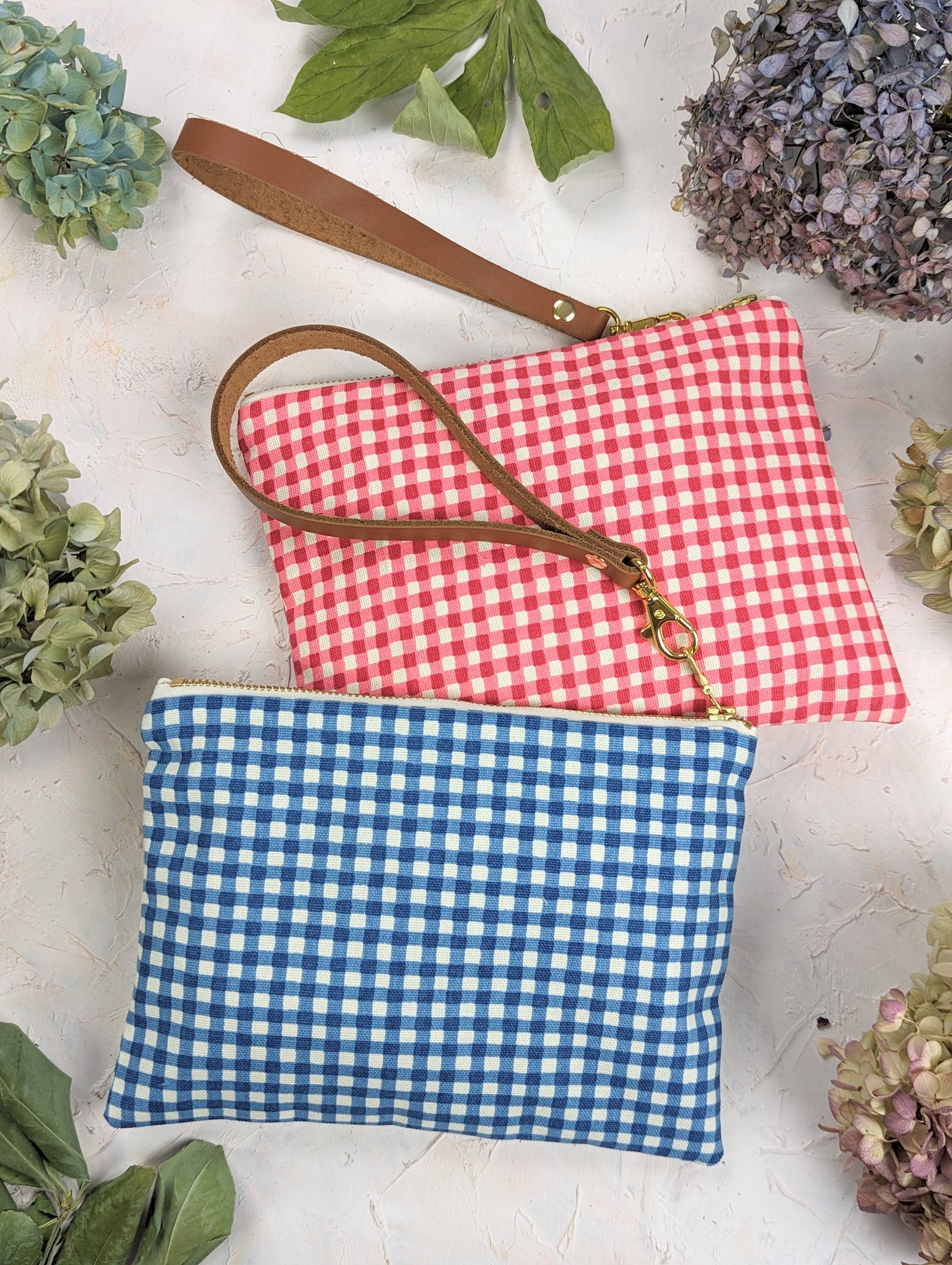 Magenta Ash & Rose Summer Picnic Wristlet Purse with adjustable strap and floral design, perfect for outdoor events.