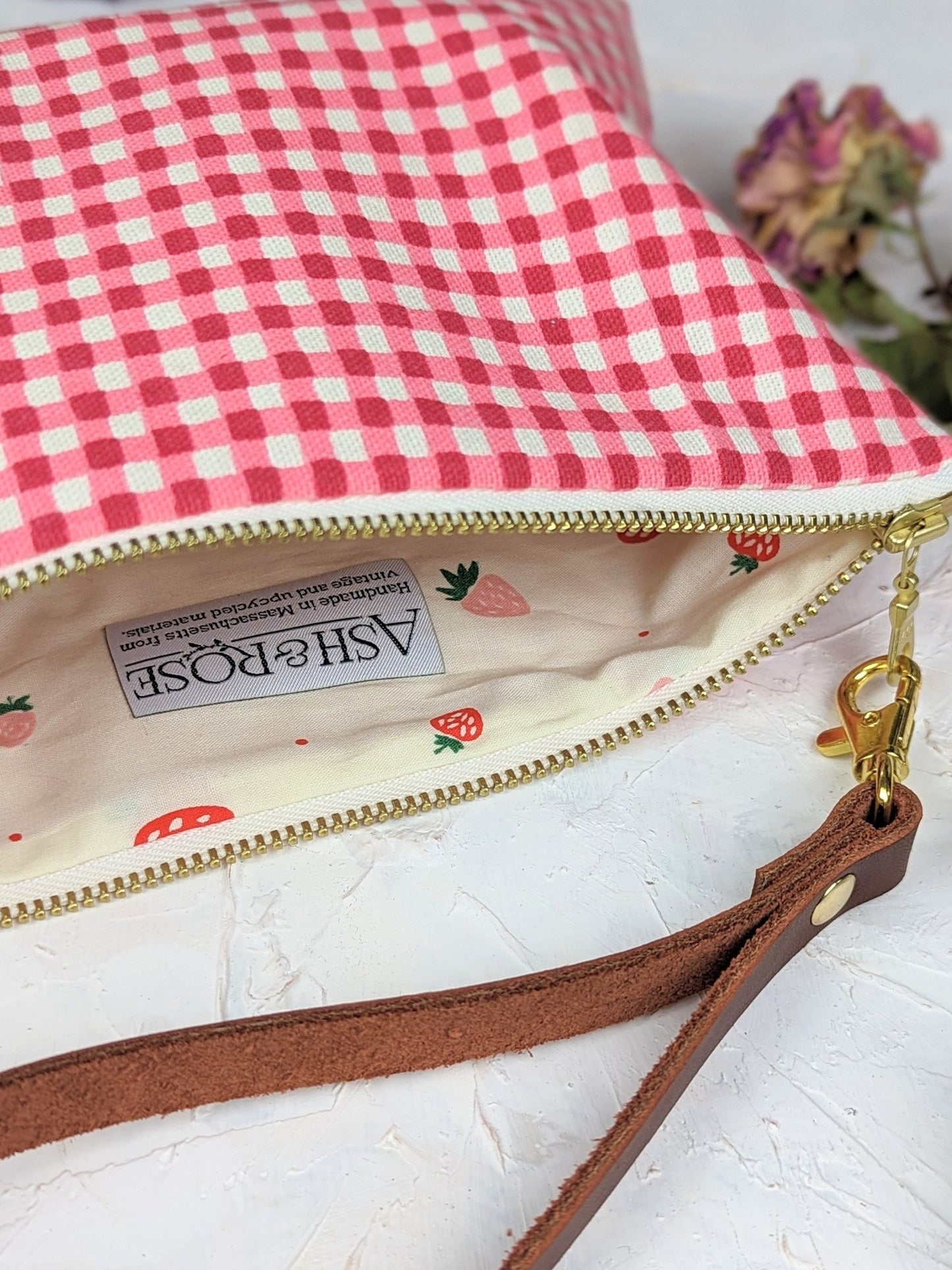Magenta Ash & Rose Summer Picnic Wristlet Purse with adjustable strap and floral pattern, perfect for casual outdoor outings.