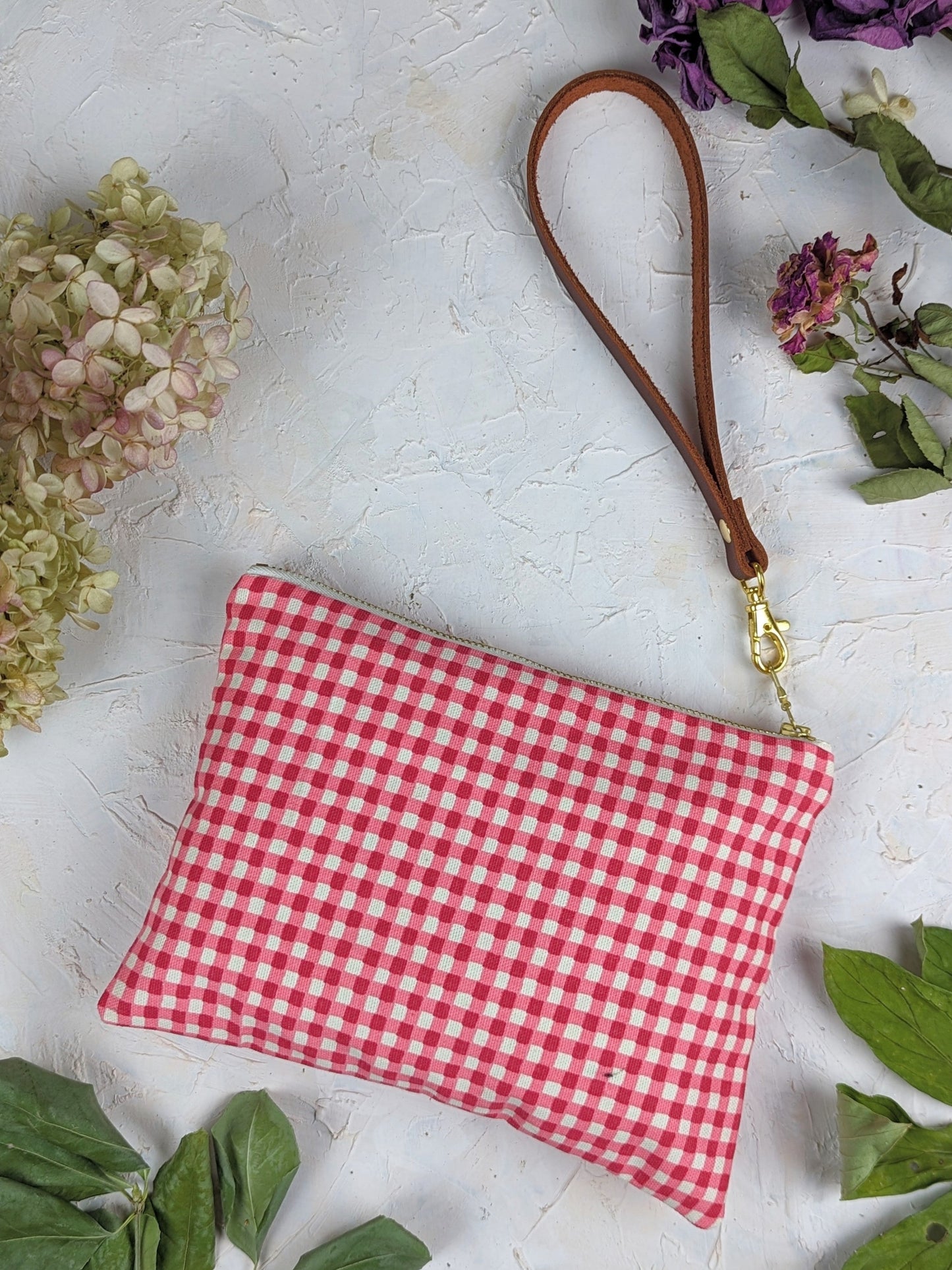 Magenta Summer Picnic Wristlet Purse by Ash & Rose with a compact design and wrist strap for casual outdoor outings.