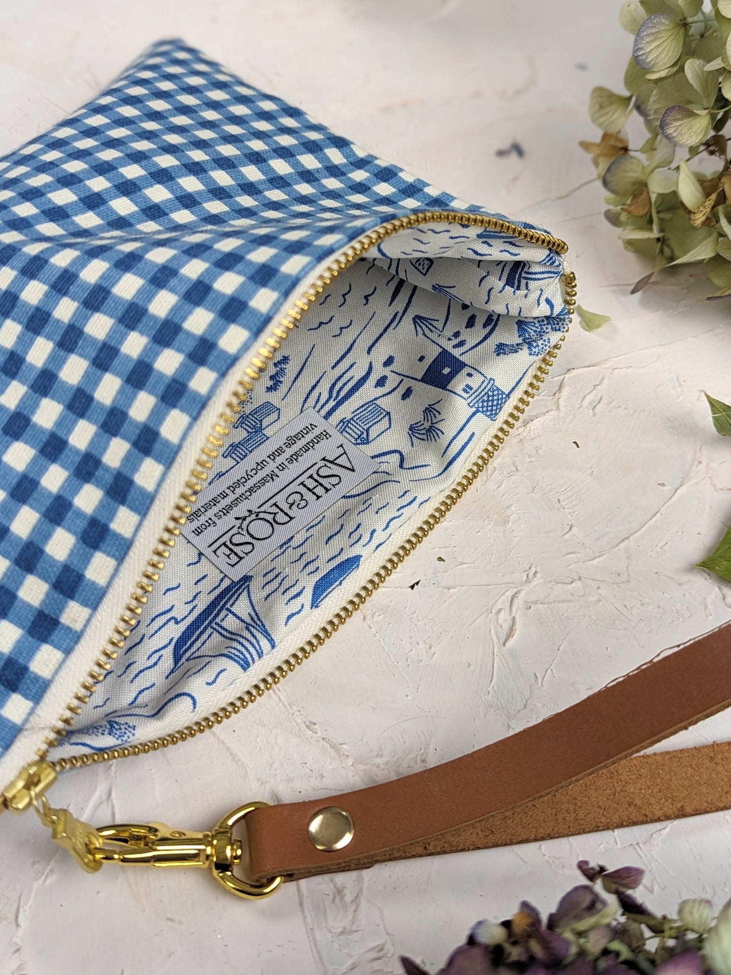 Magenta summer picnic wristlet purse by Ash & Rose with a compact design and adjustable wrist strap.