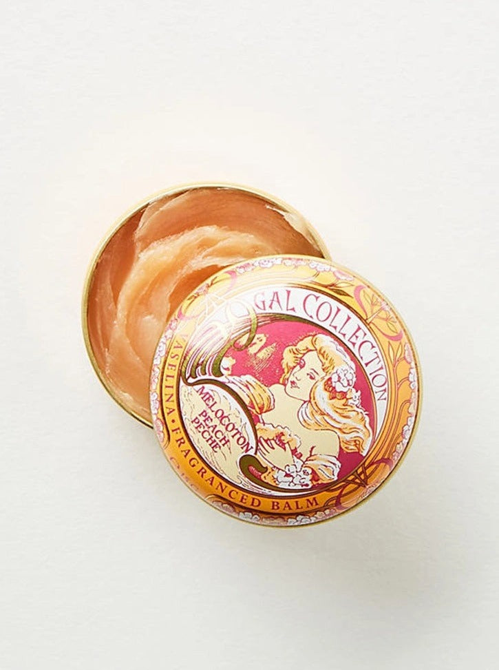 Ash & Rose Perfumeria Gal scented lip balm with orange flavor, featuring a sleek container and vibrant orange design.