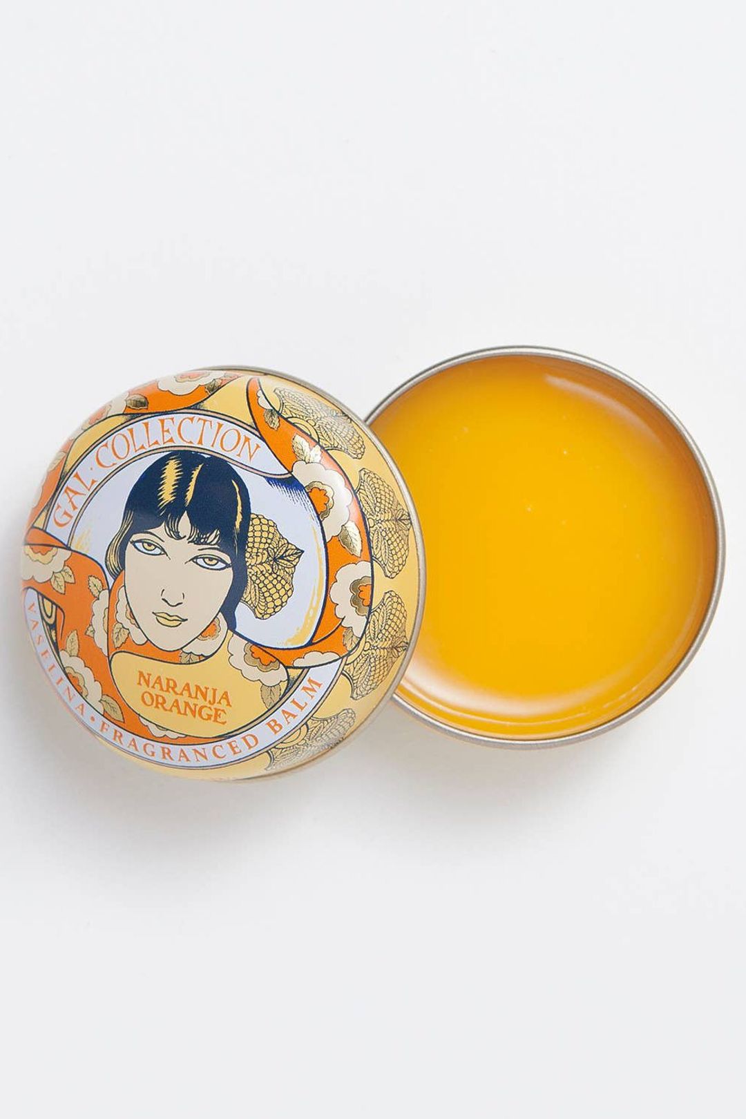 Ash & Rose Perfumeria Gal scented lip balm in orange flavor, with a smooth application and vibrant packaging.