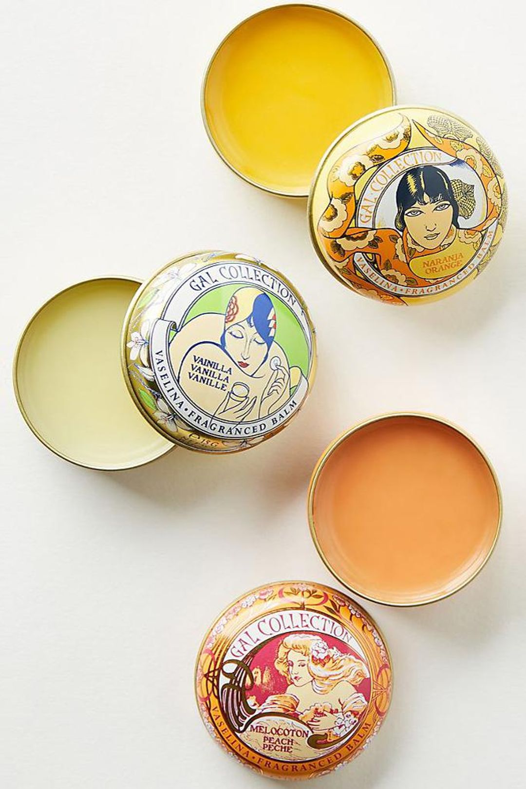 Ash & Rose Perfumeria Gal scented lip balm with orange flavor, featuring a sleek tube and vibrant packaging.