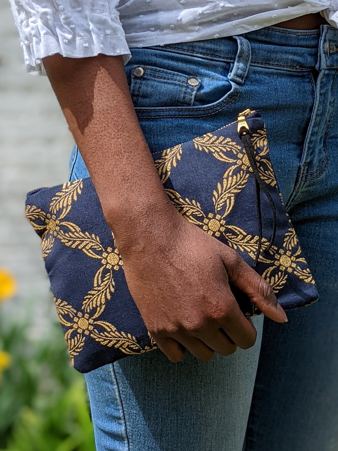 Royal blue Ash & Rose clutch purse with a sleek design and elegant fold-over flap.
