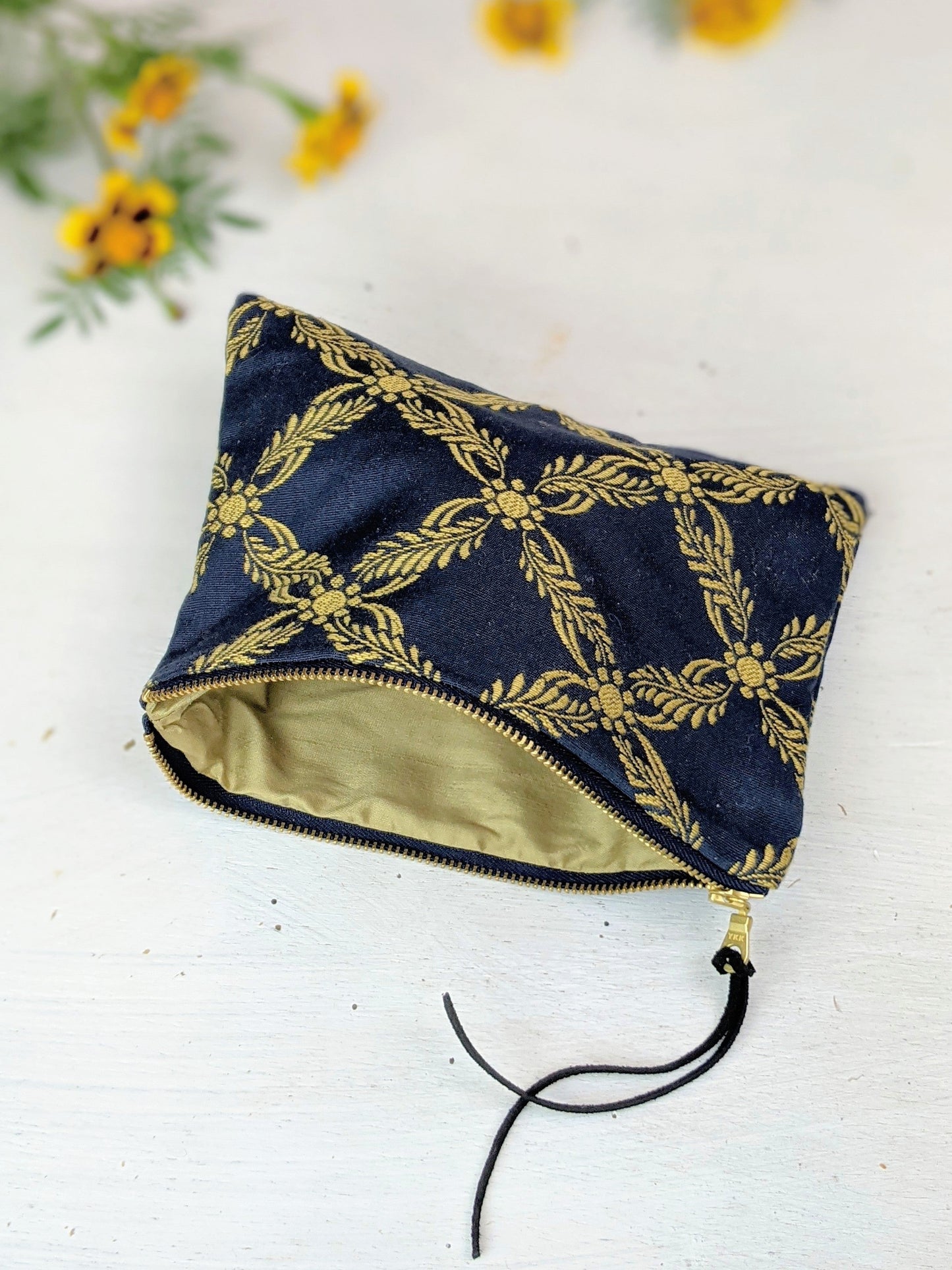 Royal blue Ash & Rose clutch purse with a sleek design and elegant finish, perfect for evening or special occasions.