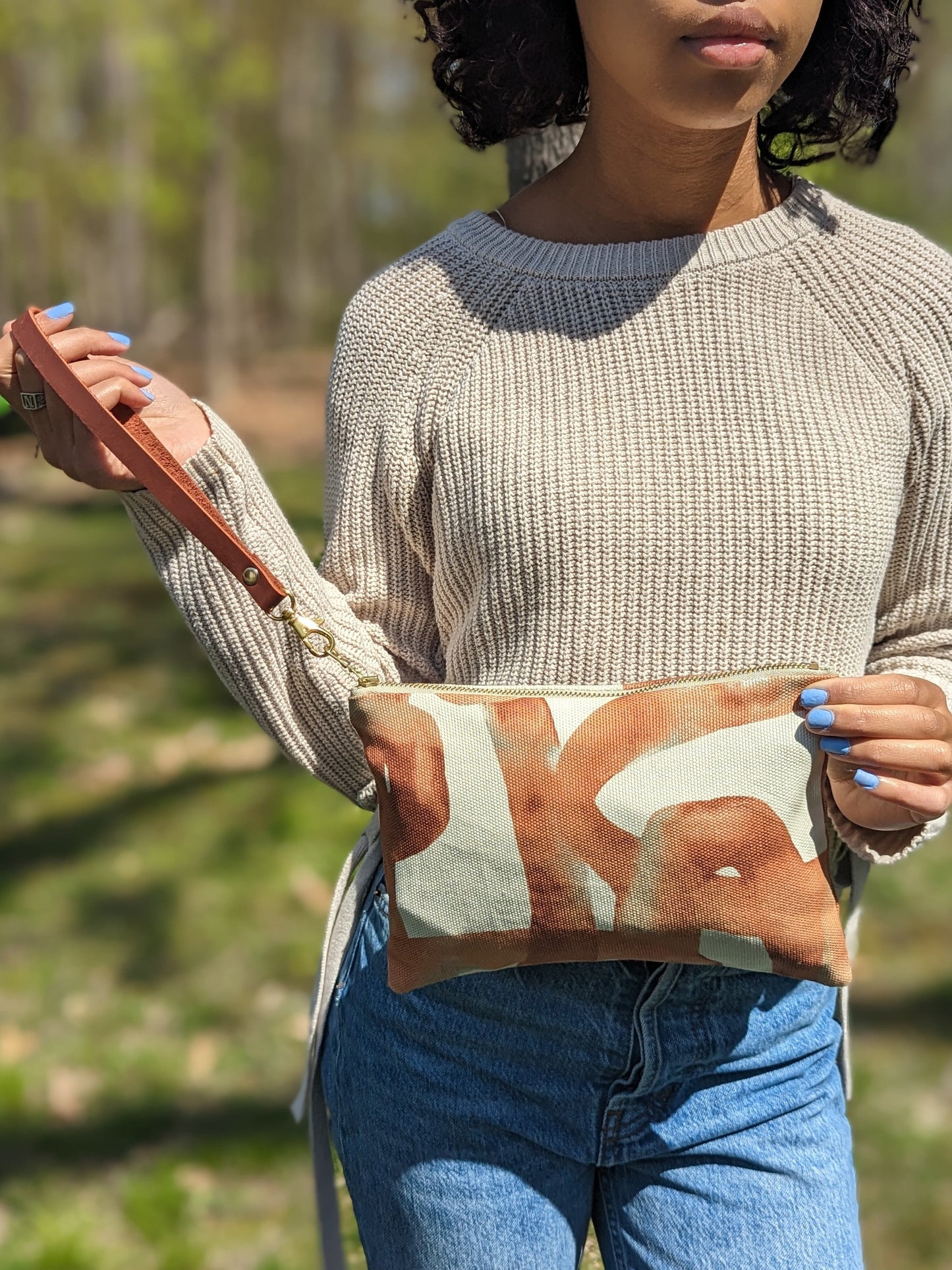 Ash & Rose Shipwreck Chain Wristlet Purse featuring a stylish chain design and compact wristlet style for easy carrying.