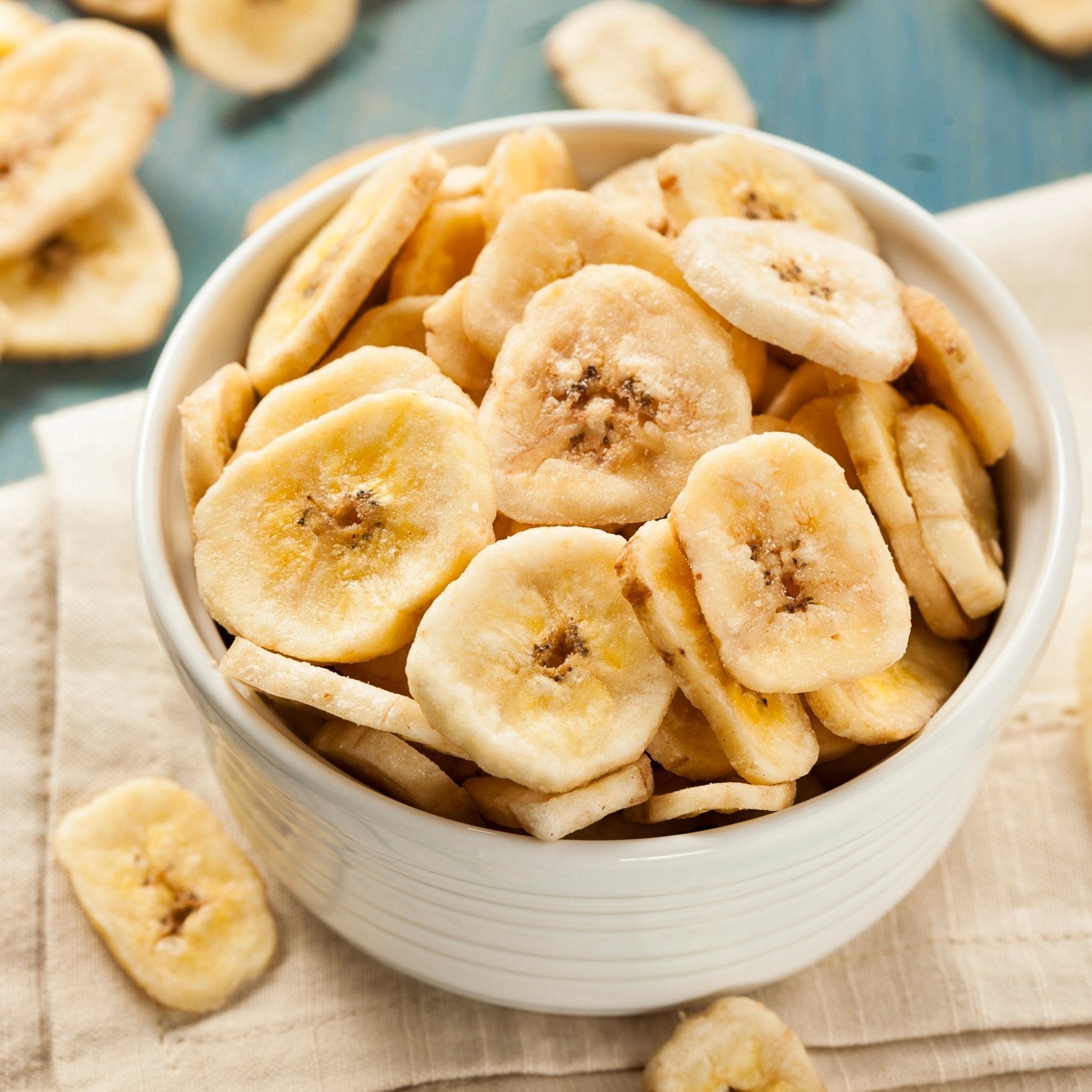 Banana Chips Family Size Pouch by Augason Farms, 34 servings, showing golden banana chips in a resealable bag.