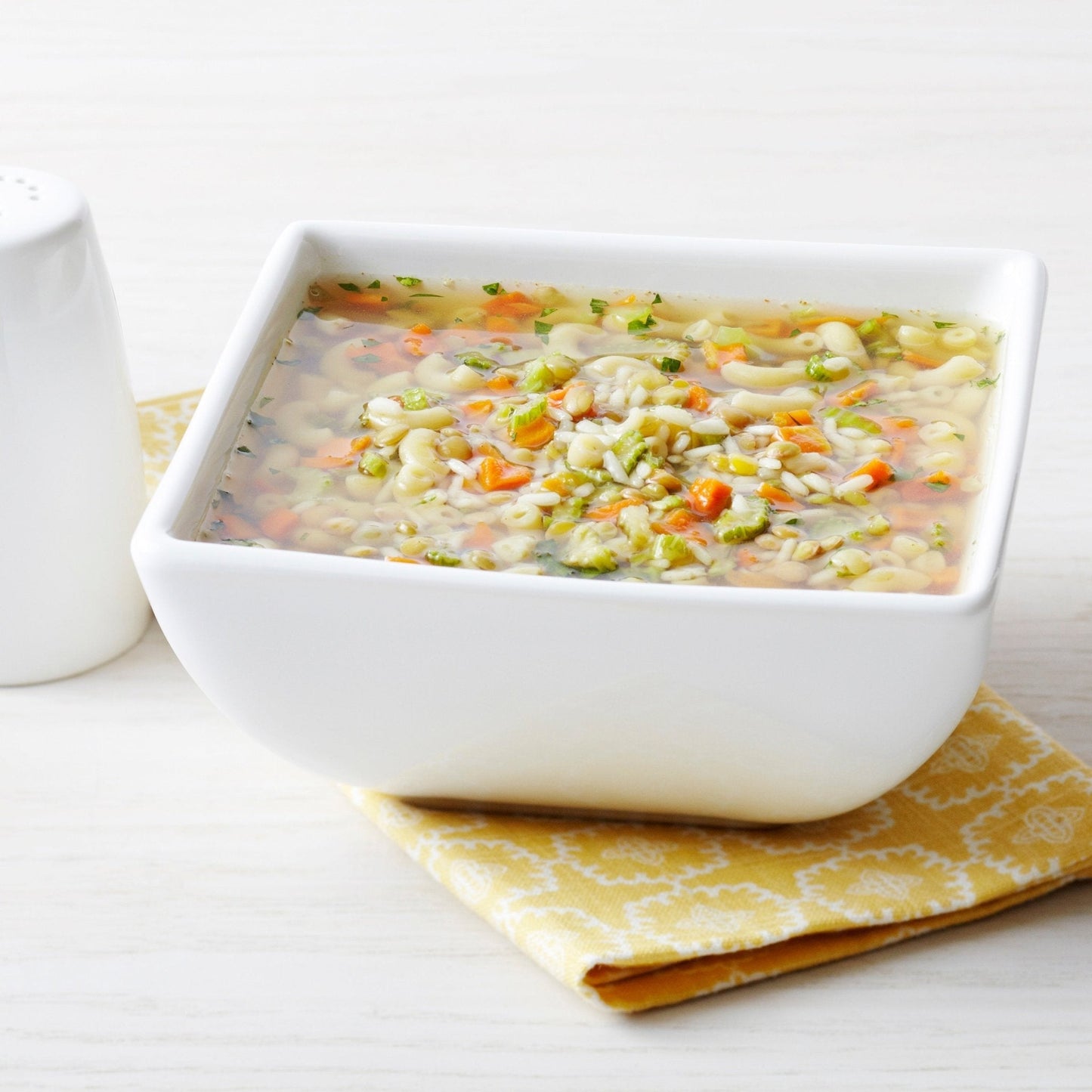 Can of dehydrated diced carrots from Augason Farms with 216 servings, showing a sealed metal can with a label.