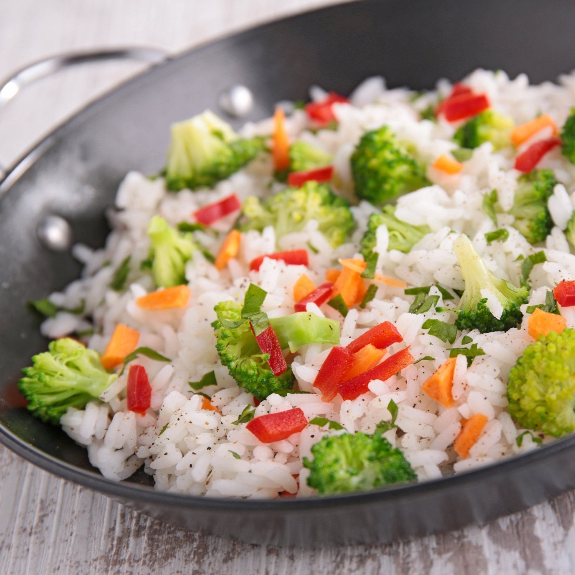 Long grain white rice from Augason Farms, packaged in a large container, suitable for long-term storage and bulk cooking.