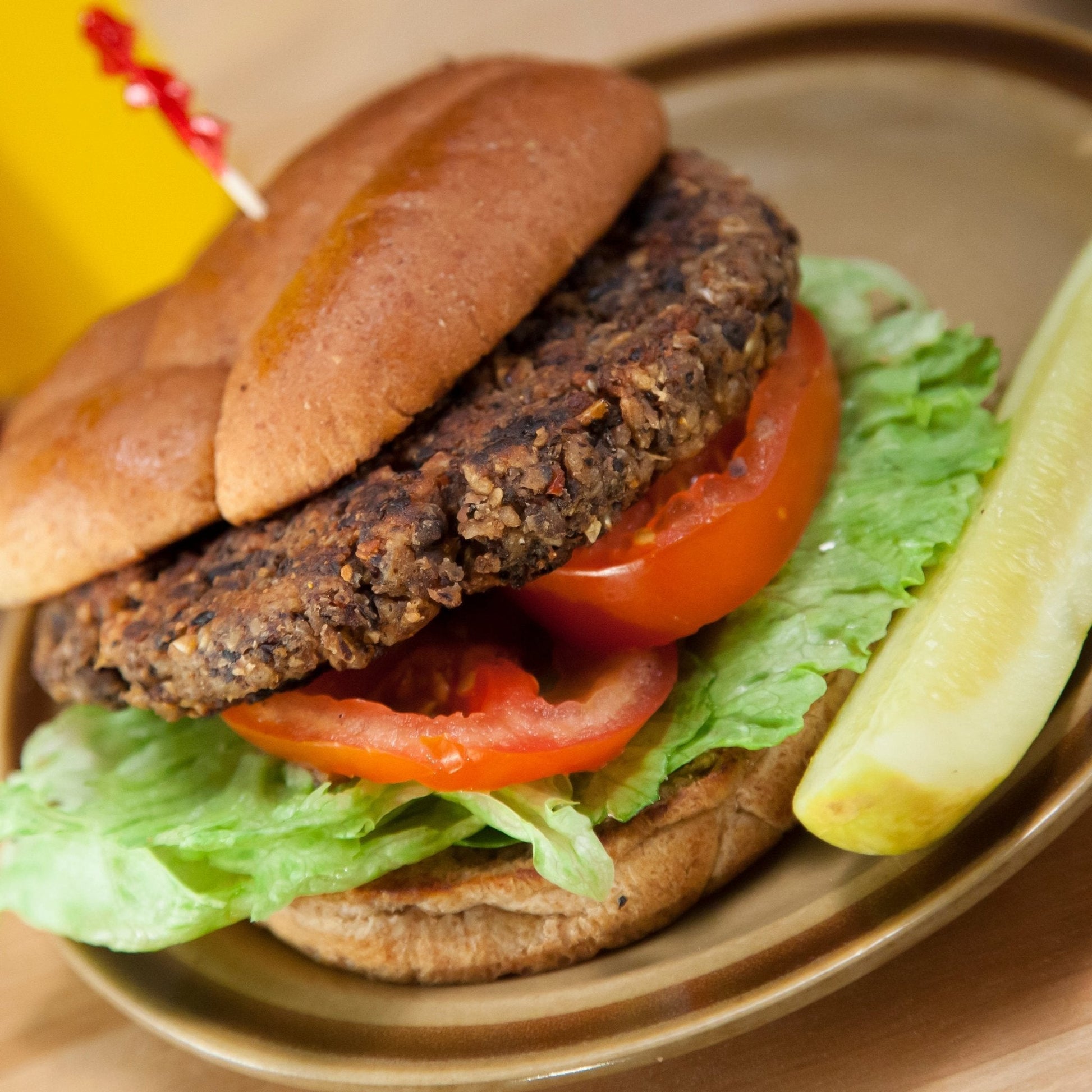 Augason Farms gluten-free black bean burger mix pouch with 9 servings, showing the product packaging and ingredients.