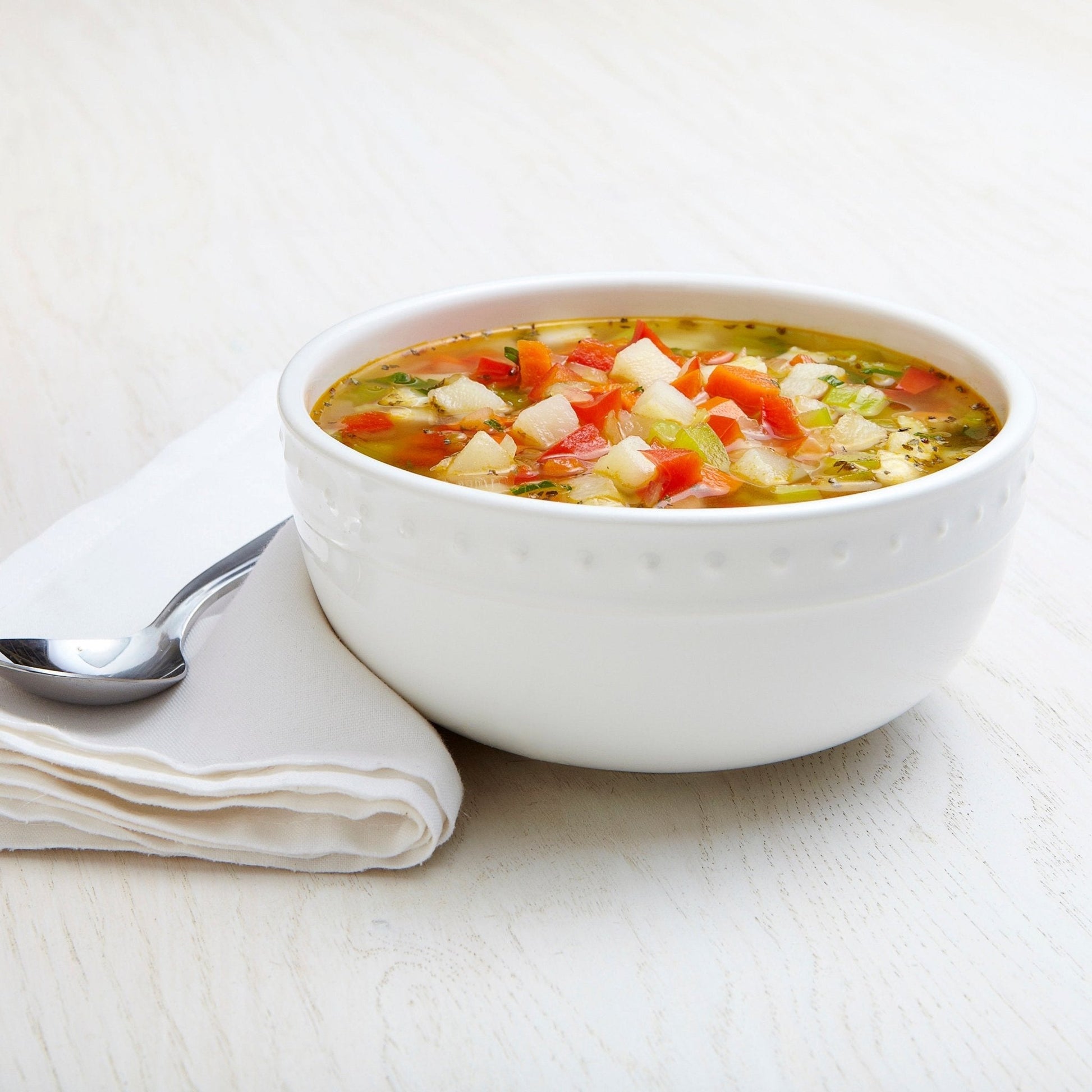 Augason Farms Vegetable Medley Blend Pouch containing 49 servings, stored in a pantry with colorful mixed vegetables.