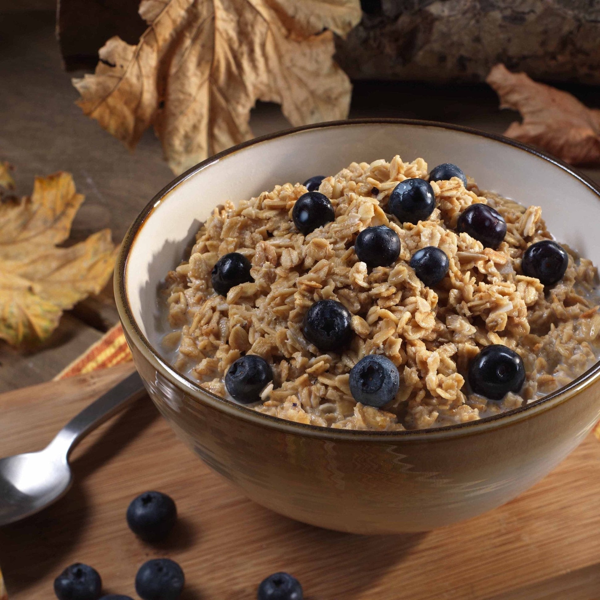 Freeze dried whole blueberries in a pouch by Augason Farms, ideal for snacking or baking, with vibrant blue berries visible.