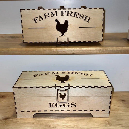 Laser-engraved AVEL Woodworking chicken egg box with detailed wood grain and engraved chicken design.