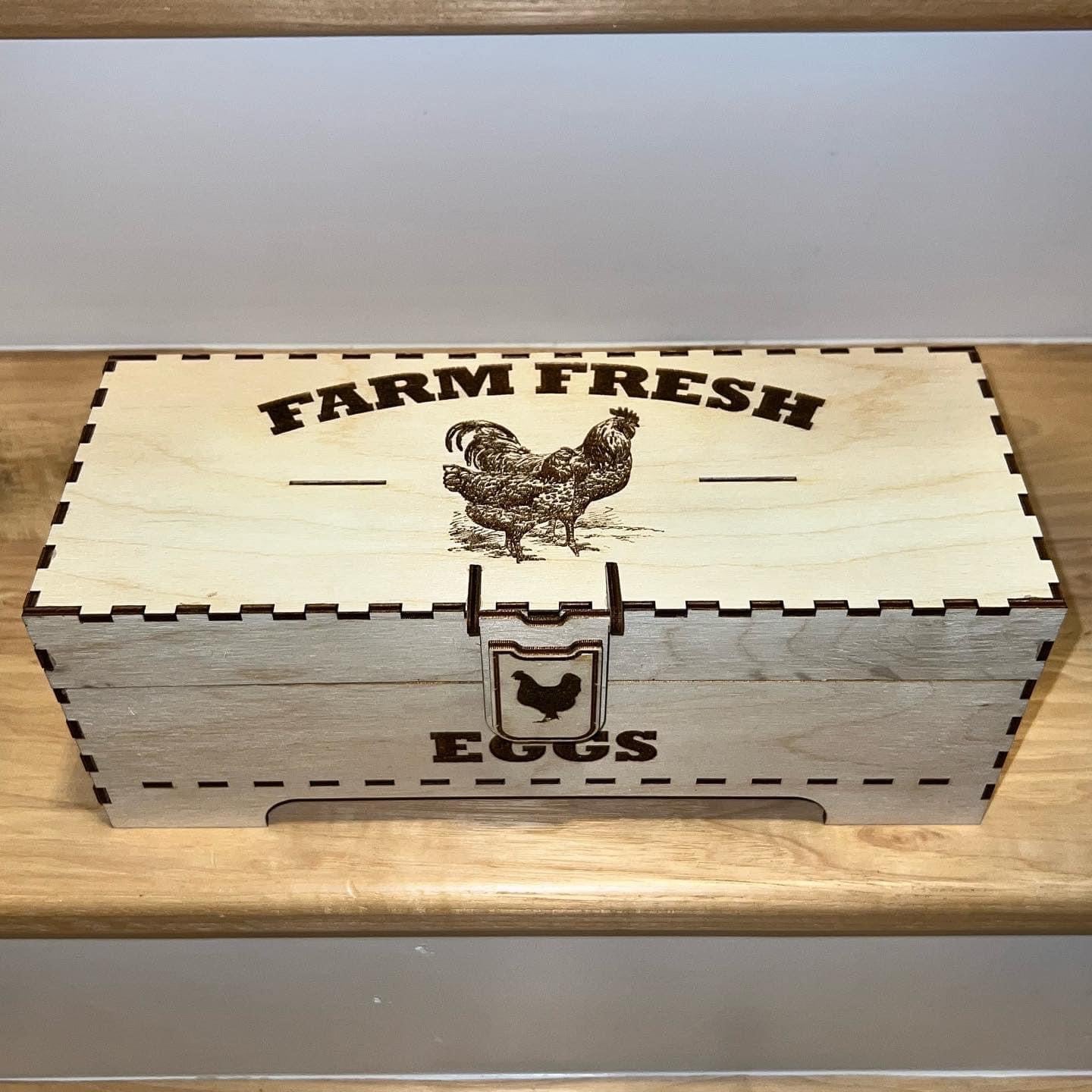 Laser-engraved wooden egg box by AVEL Woodworking featuring a single chicken design on the lid.