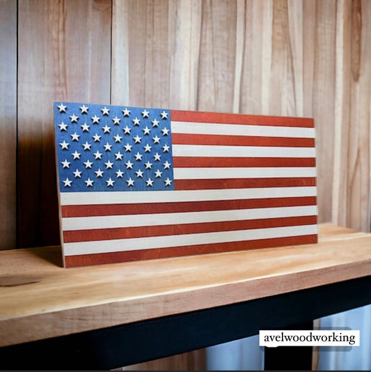 Mini stained American flag wall decor by AVEL Woodworking, featuring detailed wood craftsmanship and patriotic design.