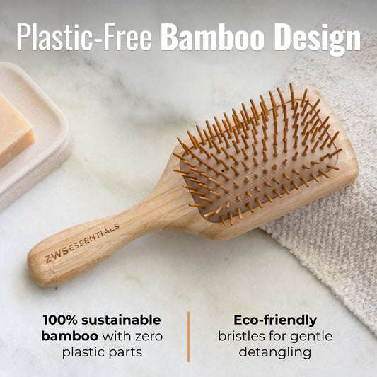 Bamboo hair brush from ZeroWasteStore.com with natural bamboo handle and wide teeth for gentle detangling.