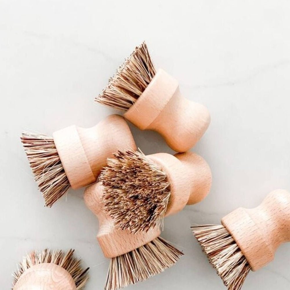 Tilley + Me sustainable bamboo pot scrubber with palm fiber bristles for gentle yet effective dish cleaning.